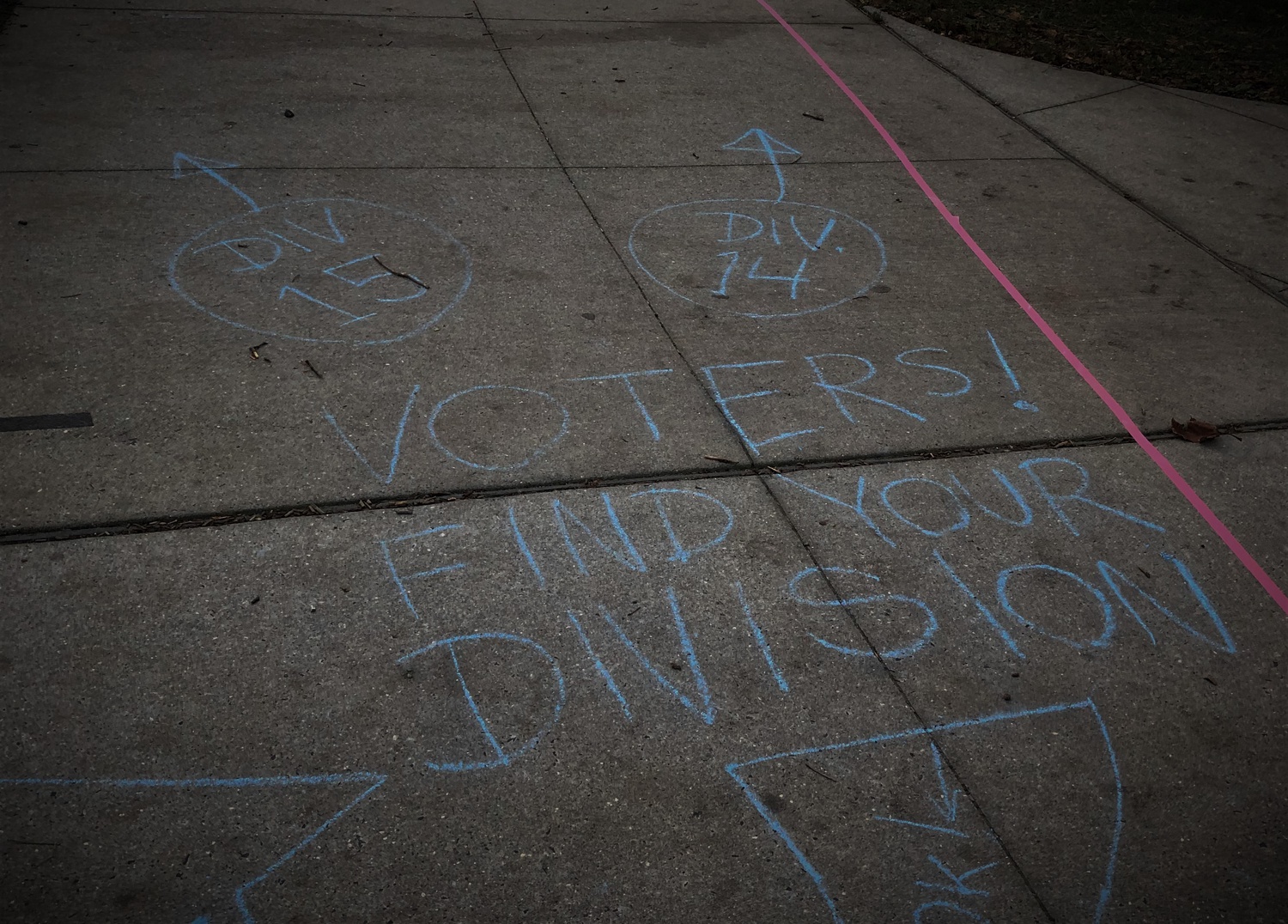 With chalk and tape, poll workers in Philadelphia attempt to guide voters to their appropriate division, all while maintaining safe social distance.