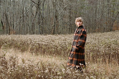 Cover image for ‘evermore’ Spins Glitter from Sawdust
