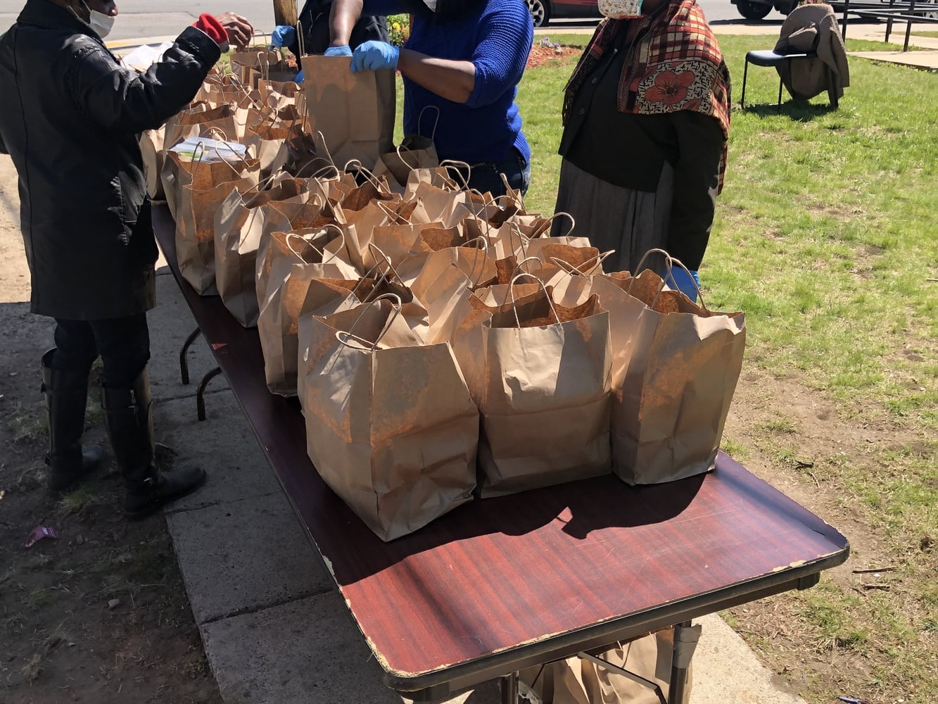 Toutwèl Restaurant distributes meals in Boston through the CommonTable restaurant program. Commonwealth Kitchen created and runs this program.