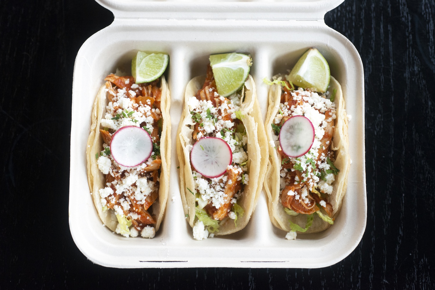Chef Jeremy Sewall's La Ventana offers Smoked Chipotle Chicken Tacos.