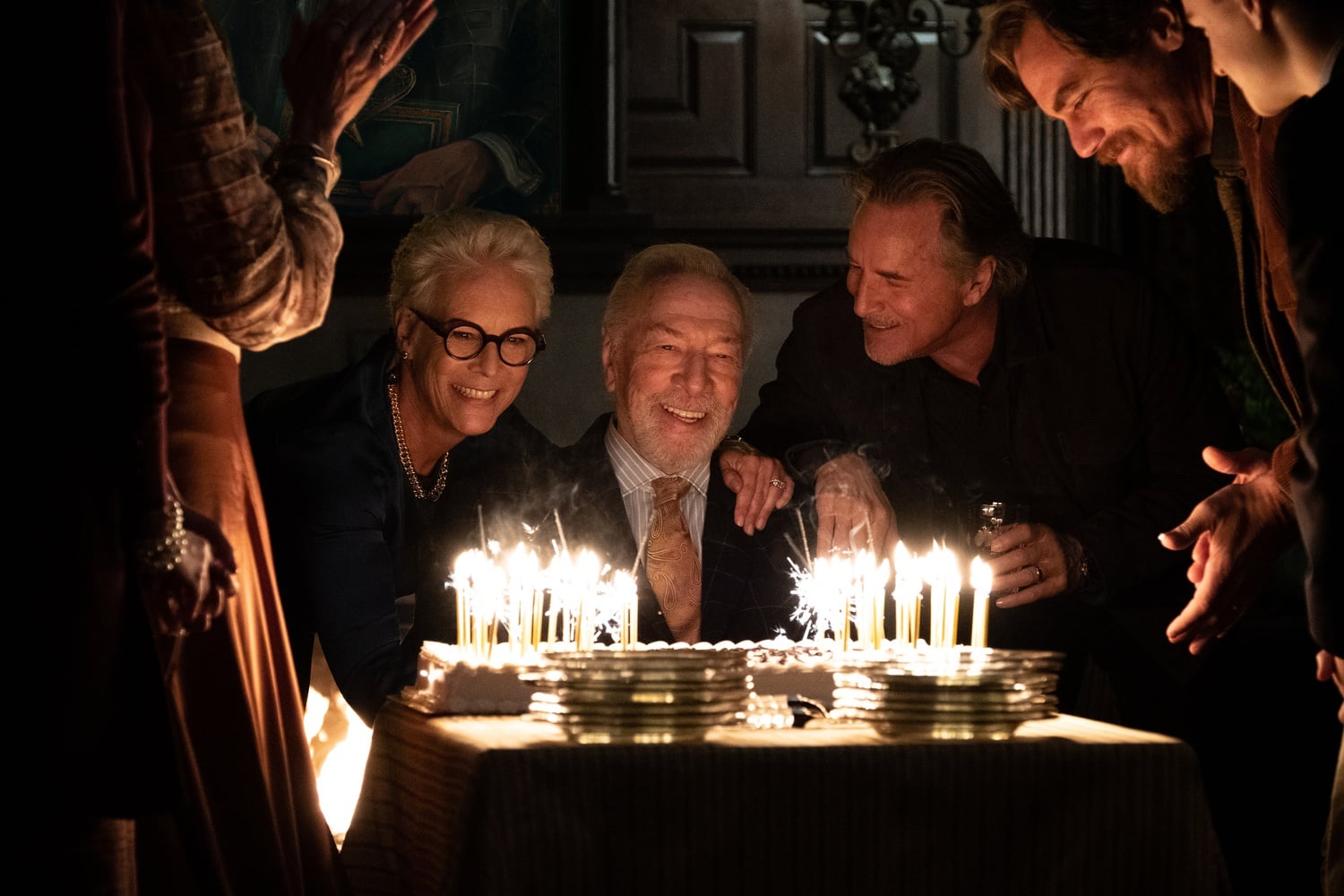 Christopher Plummer (center) starred as Harlam Thrombey in "Knives Out" (2019), directed by Rian Johnson.