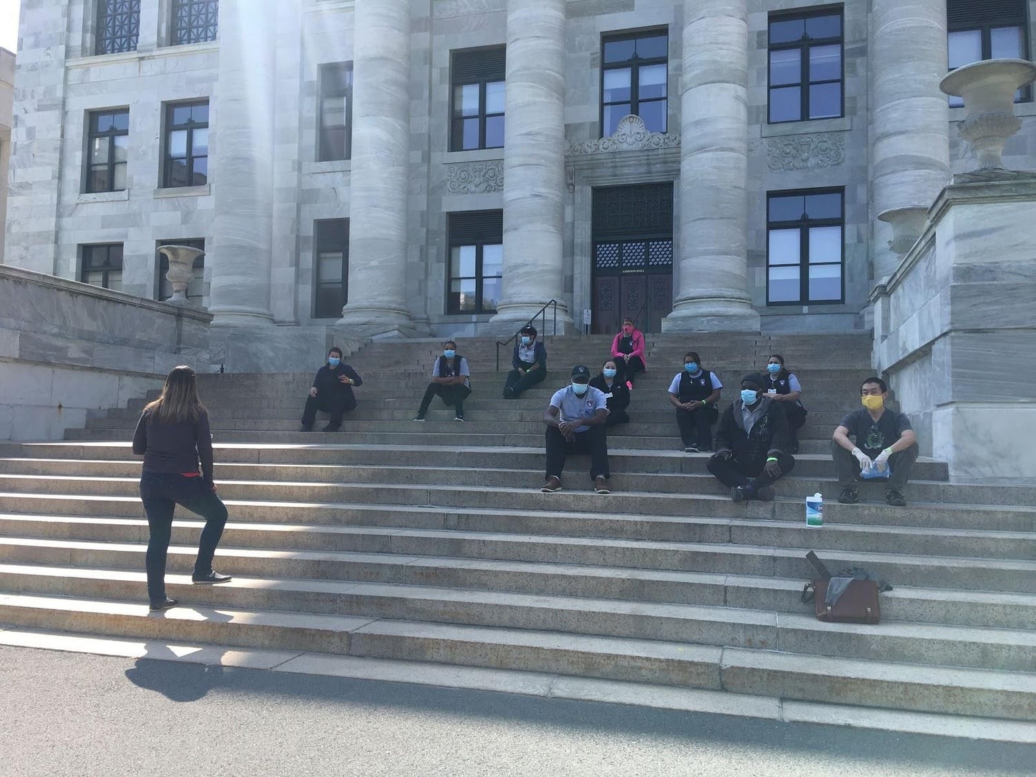 Yasmin Escobedo Lozoya, a genetics postdoctoral fellow and member of the Harvard Medical School Genetics Anti-Racism Group, leads a teach-in to provide staff with Covid-19 testing information.