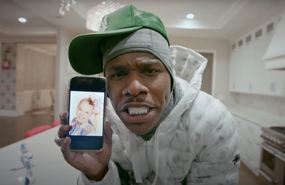 Cover image for What the Hell Happened: JoJo Siwa vs. DaBaby?