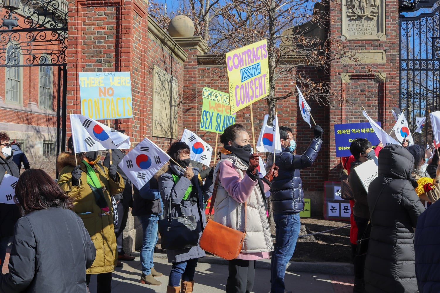 Dozens of demonstrators gathered outside Johnston Gate on March 6 in a protest organized by the Korean American Society of Massachusetts against Harvard Law professor J. Mark Ramseyer and his recent controversial paper on comfort women.
