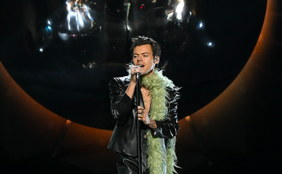 Cover image for Harry Styles performing.