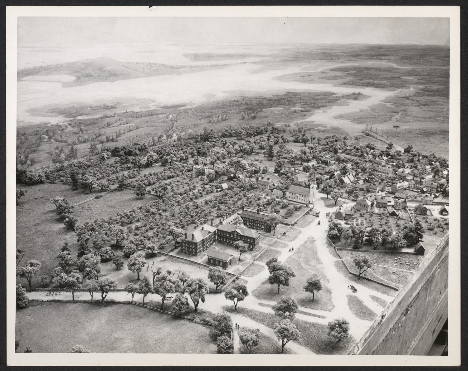 This 1947 photo shows the Pitman diorama of Harvard in 1775 looking down Cambridge Common. The year before campus became quarters for American militiamen amid the Revolution, Harvard Yard had only a dotting of colonial buildings.