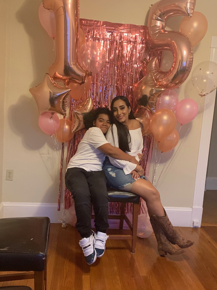 Iturralde and her son Nicholas celebrate her sister's 15th birthday in April.