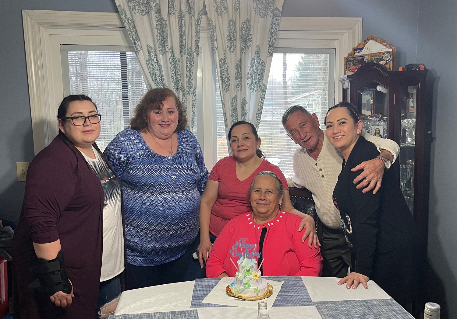Martinez and her sisters surprised her mother with a birthday lunch when Martinez's parents flew over from El Salvador to Rhode Island.