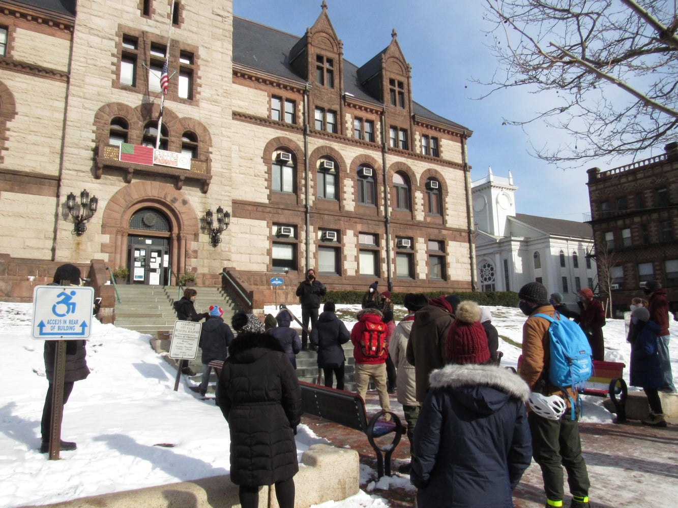 Councilor Jivan Sobrinho-Wheeler addresses Project Right to Housing advocates during a "Literature Drop" event on Sunday, Jan. 31.