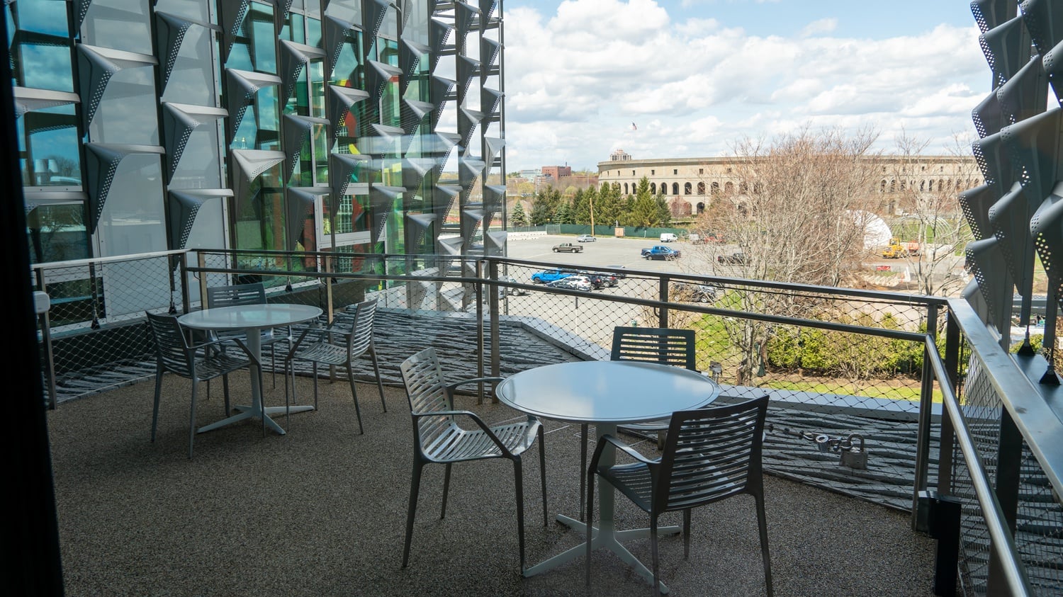 One of the SEC's several outdoor balconies overlooks the nearby Harvard Stadium, facing north-northwest.