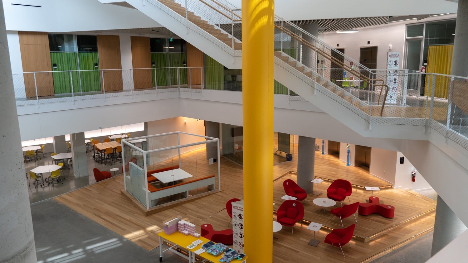 The central open space of the bottom floor serves as a dedicated study lounge for undergraduates.