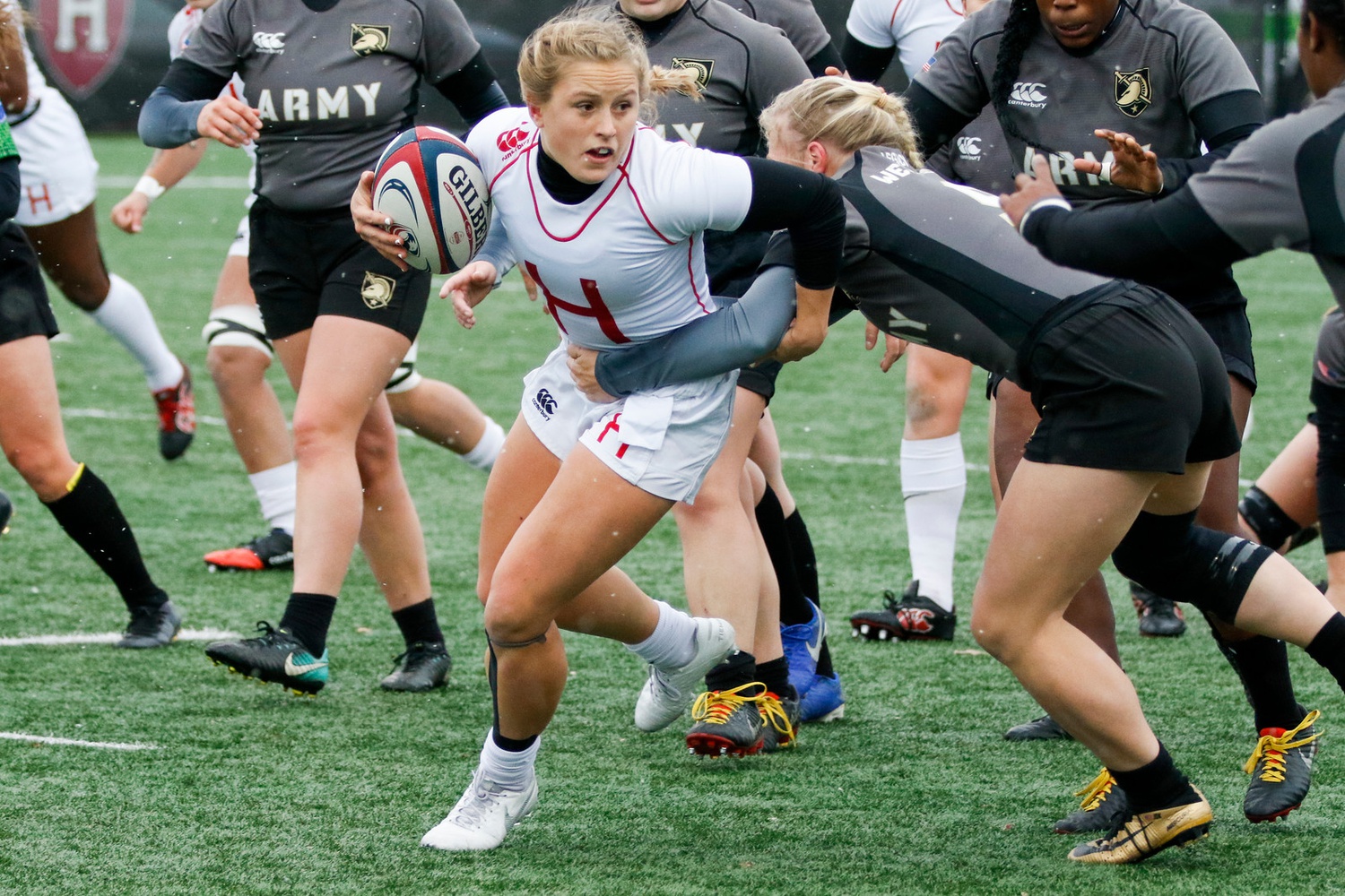 Cassidy Bargell evades an opponent as she helps Harvard women's rugby win the 2019 NIRA National Championship.