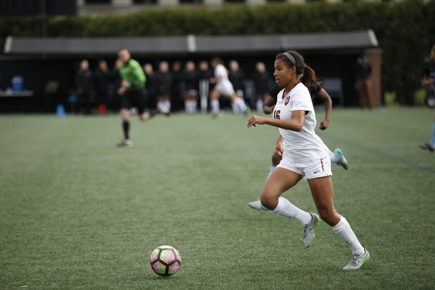 Midge Purce '17 races through the defense, looking to score one of her 42 career goals for the Crimson.