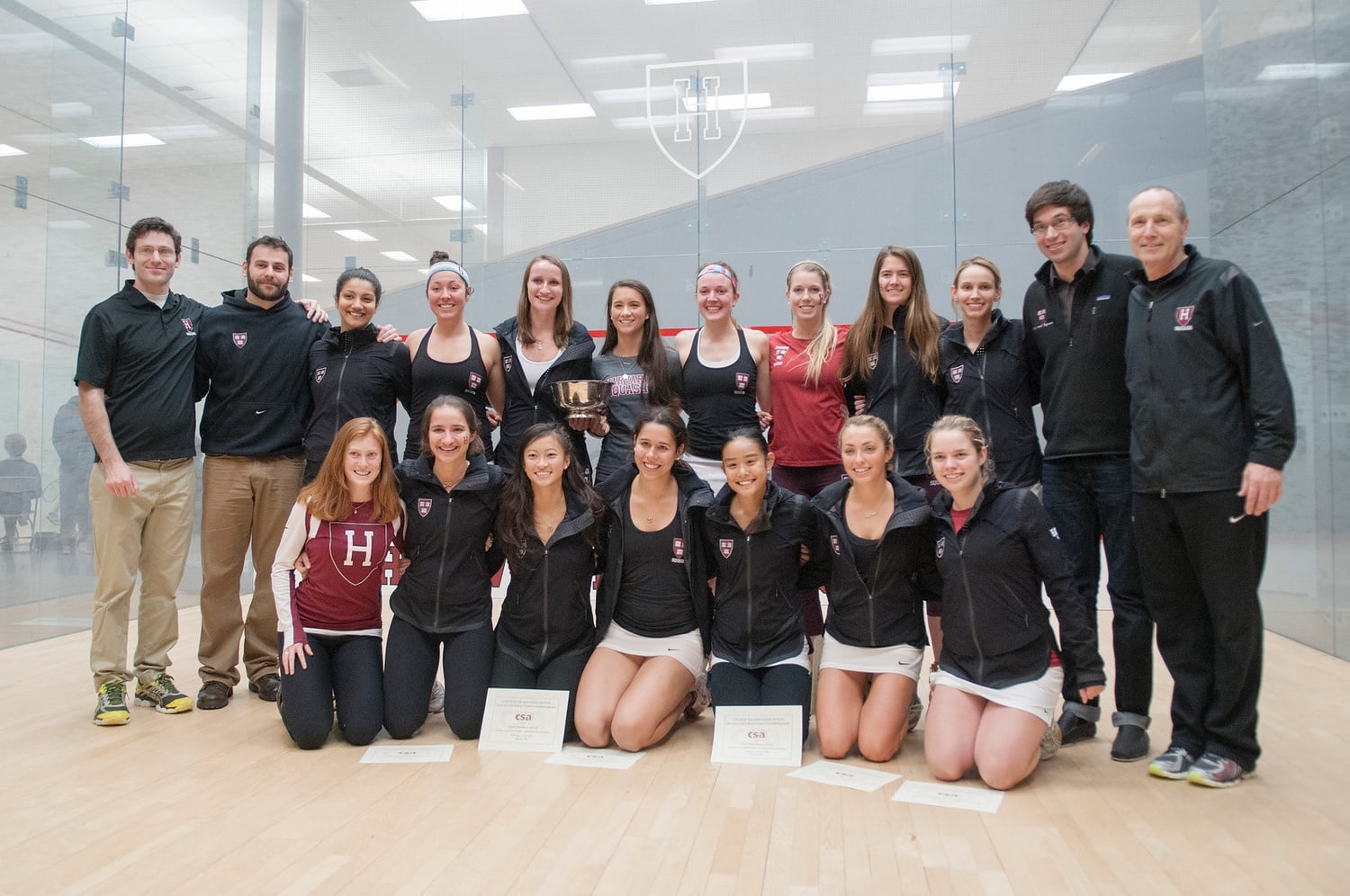 Amanda Sobhy ’15 and Haley Mendez ’15, back row fourth from the left and back row fifth from the left, respectively, pose after capturing the 2015 National Championship. While not a member of the 2015 squad, and thus not pictured, Sabrina Sobhy ’19 would go on to capture four national championships in her four years with the Crimson.