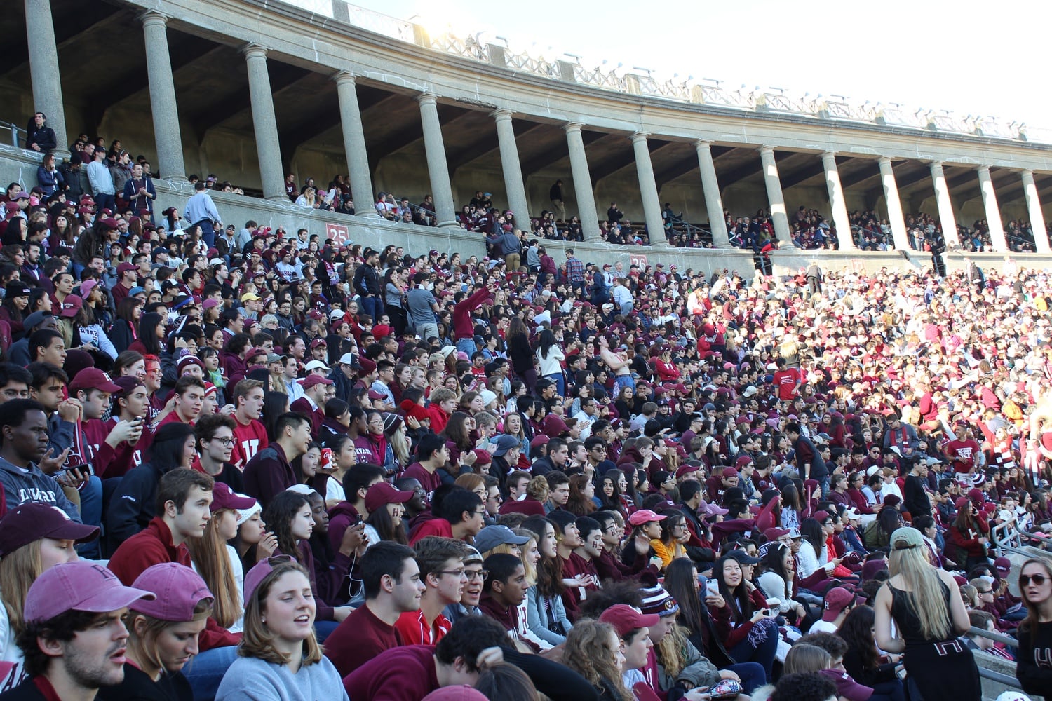 A capacity crowd fills Harvard Stadium in the 2016 football game against Yale, the last time "The Game" took place at Harvard. Fenway Park hosted the 2018 contest, and the 2020 installment was canceled. In 2020-21, The Harvard Athletic Center has remained largely empty to contests and spectators, opening only to limited groups of student-athletes to practice. All of this will change soon.