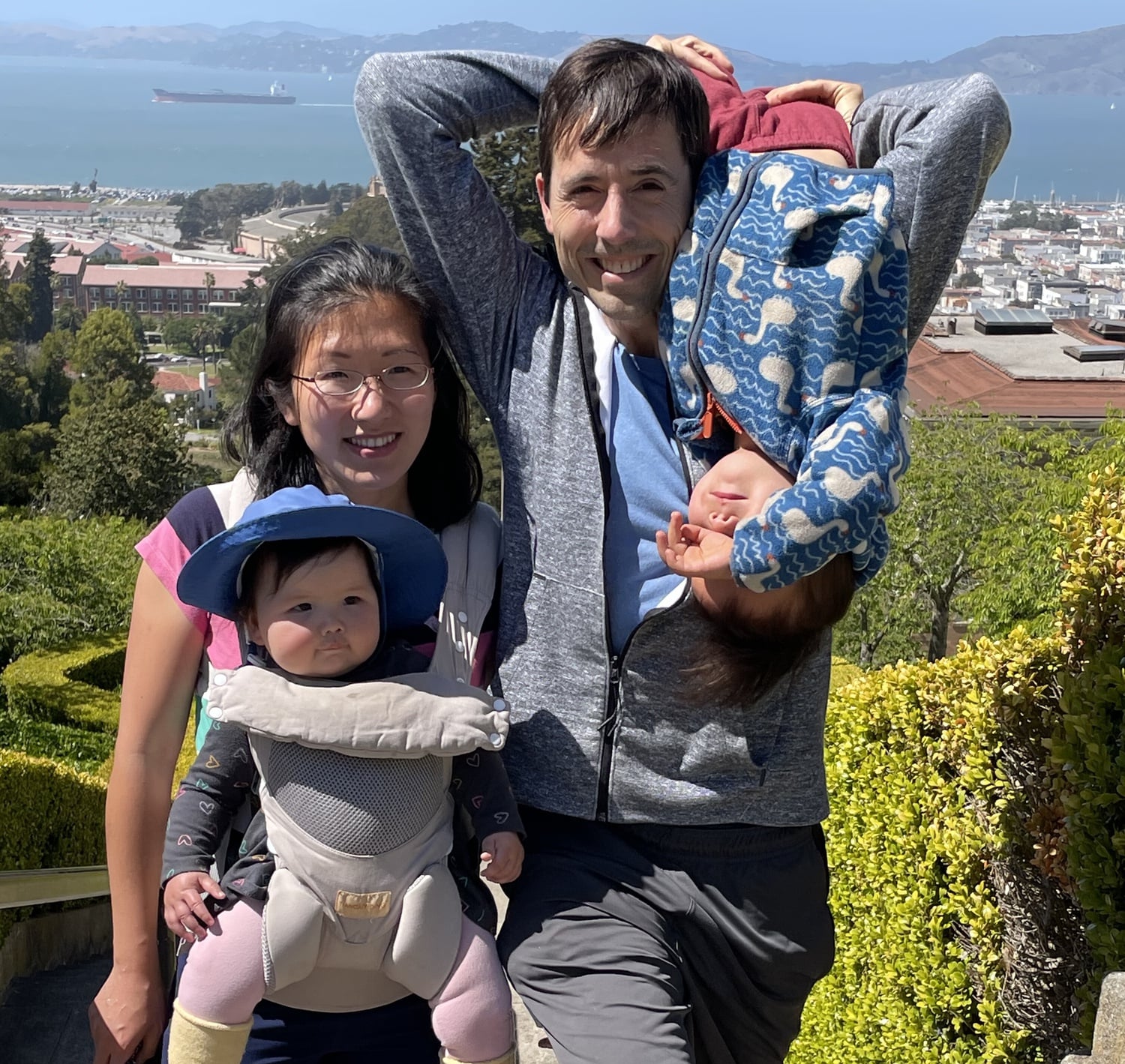 Philip W. Kreycik ’06 with his wife Jennifer Yao and their two children.