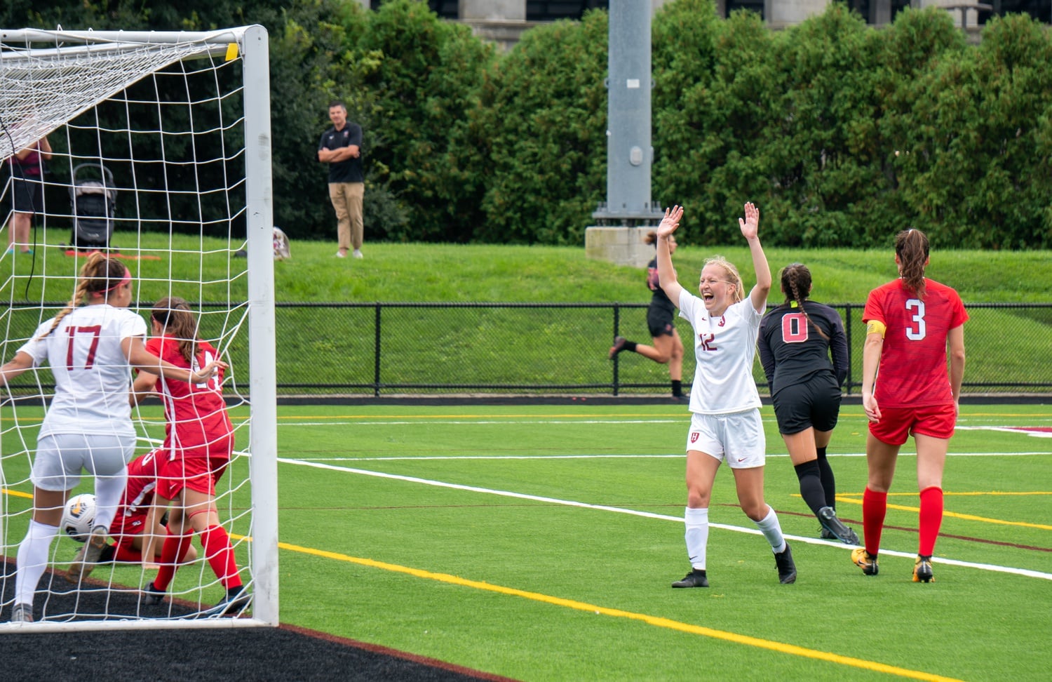 Sophomore defender Taylor Fasnacht scores on the way to a 3-2 Crimson victory against St. John's on Sept. 5. Since the victory against the Red Storm, Harvard has drawn once and won once to maintain an undefeated record.