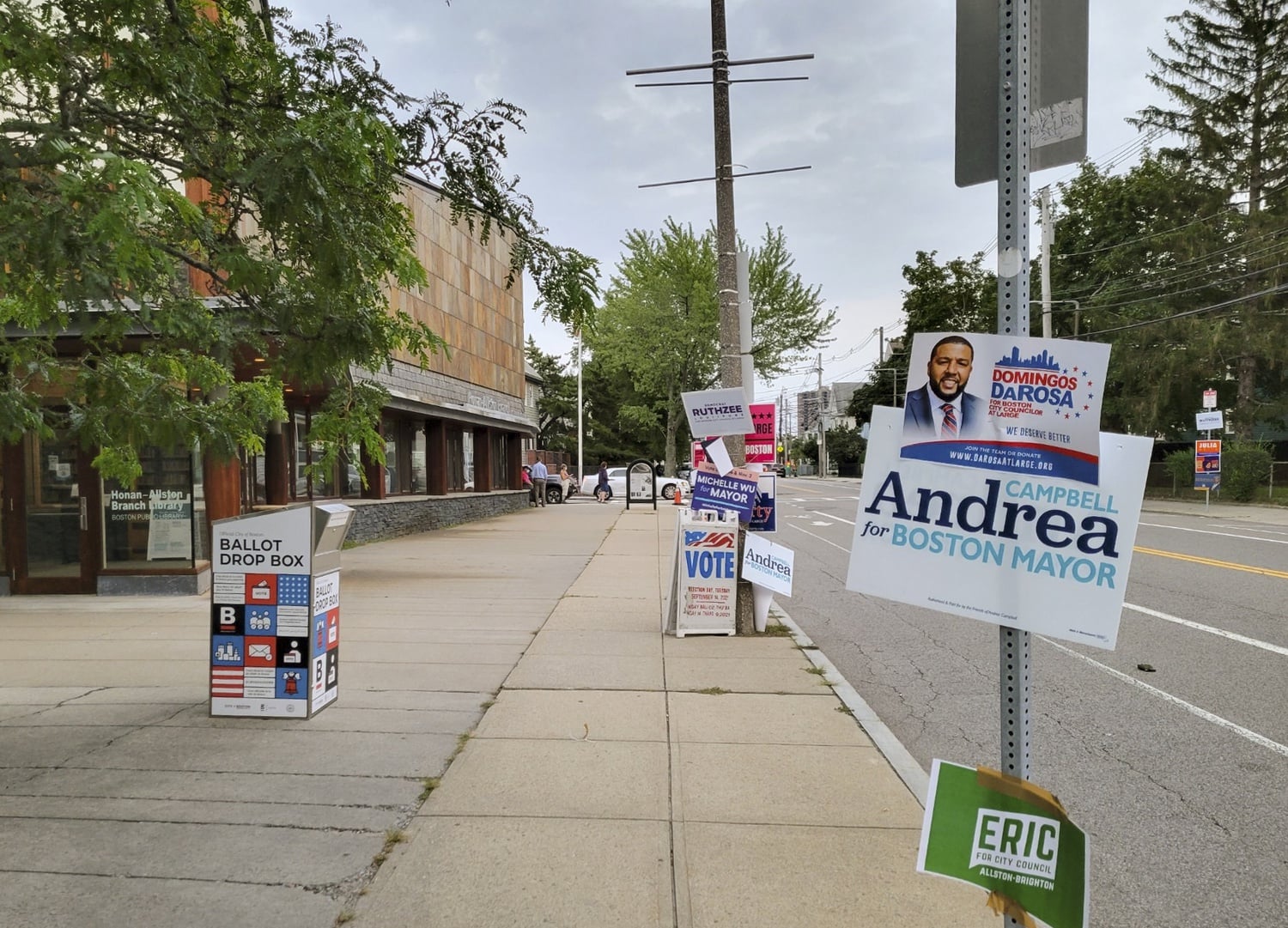 Voters drop off ballots at the Honan-Allston Branch Library Tuesday morning. Boston held its preliminary Mayoral and City Council elections this week.