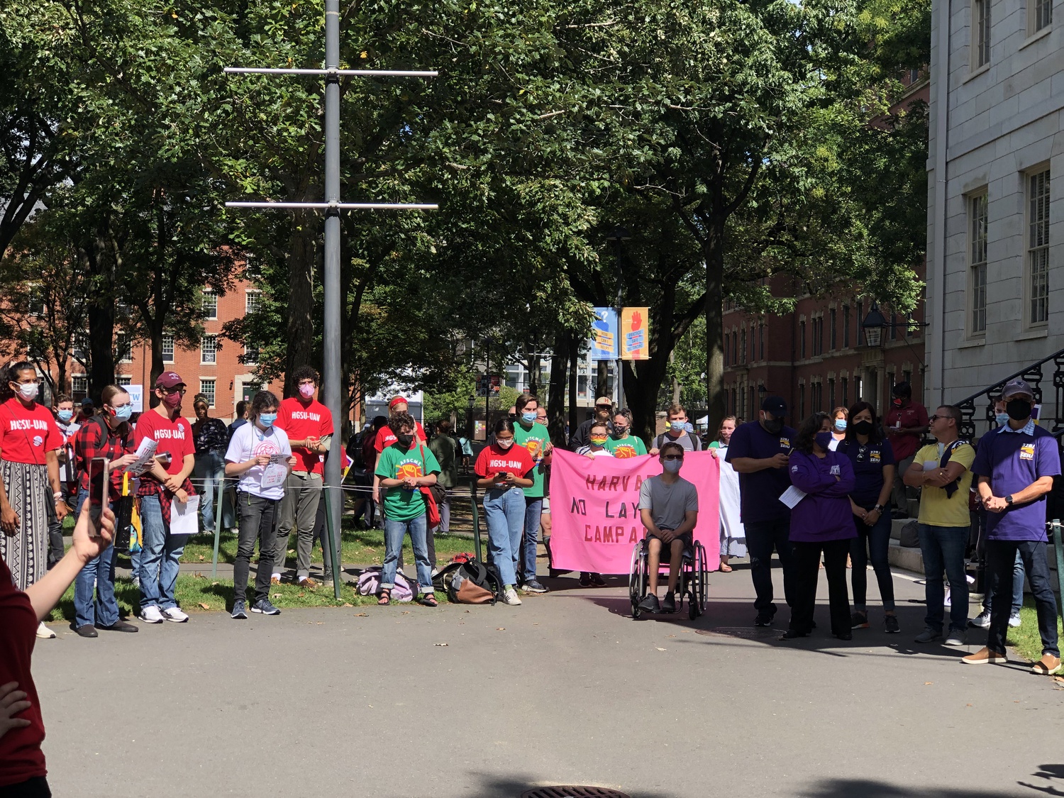 More than 120 members and supporters of five Harvard unions at various stages of contract negotiations with the University jointly rallied for contracts and benefits Tuesday.