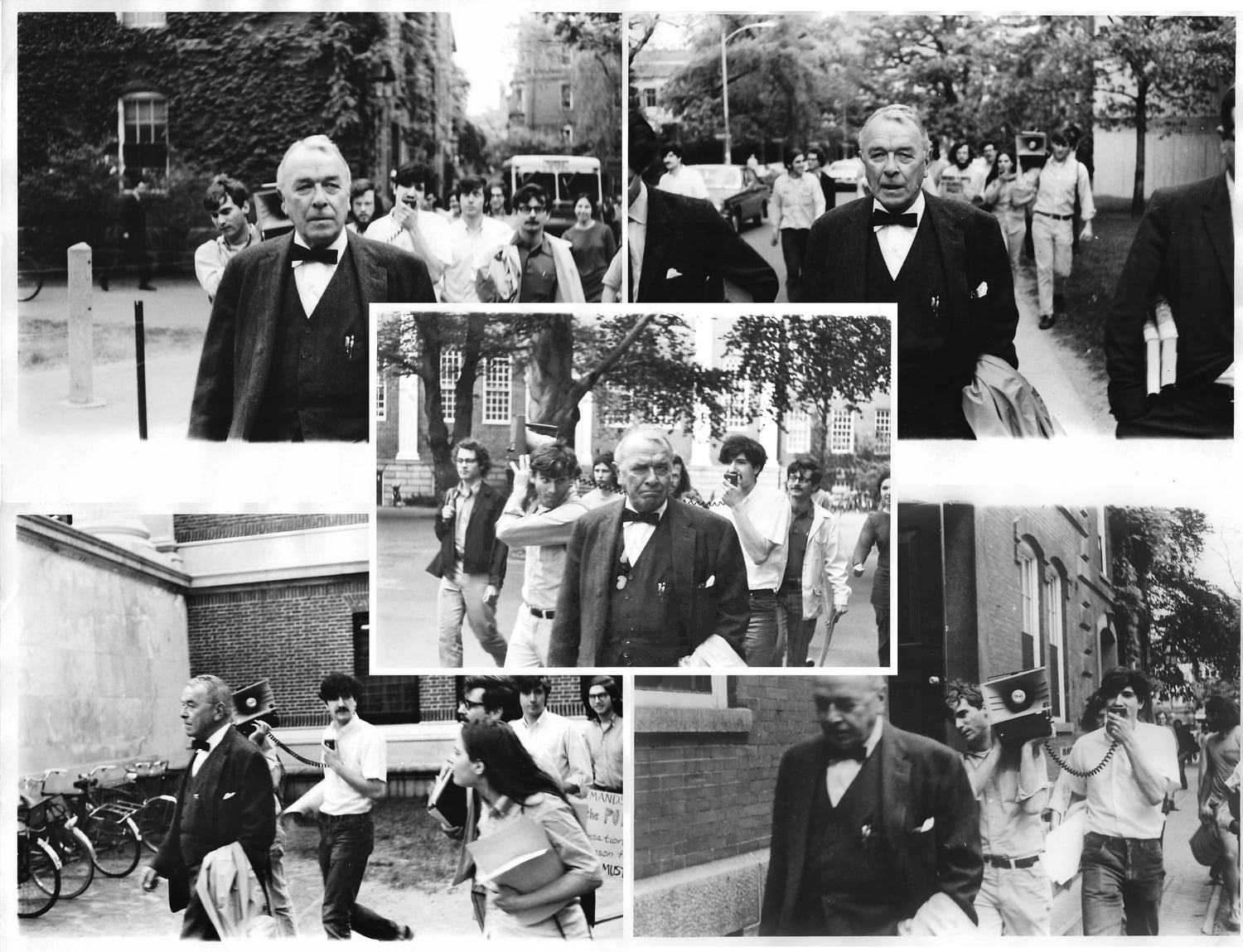 Students for a Democratic Society members tail and shout down Sargent Kennedy '28, the Harvard Corporation secretary, through Harvard Yard. Ira D. Helfand '71 is pictured holding a bullhorn.