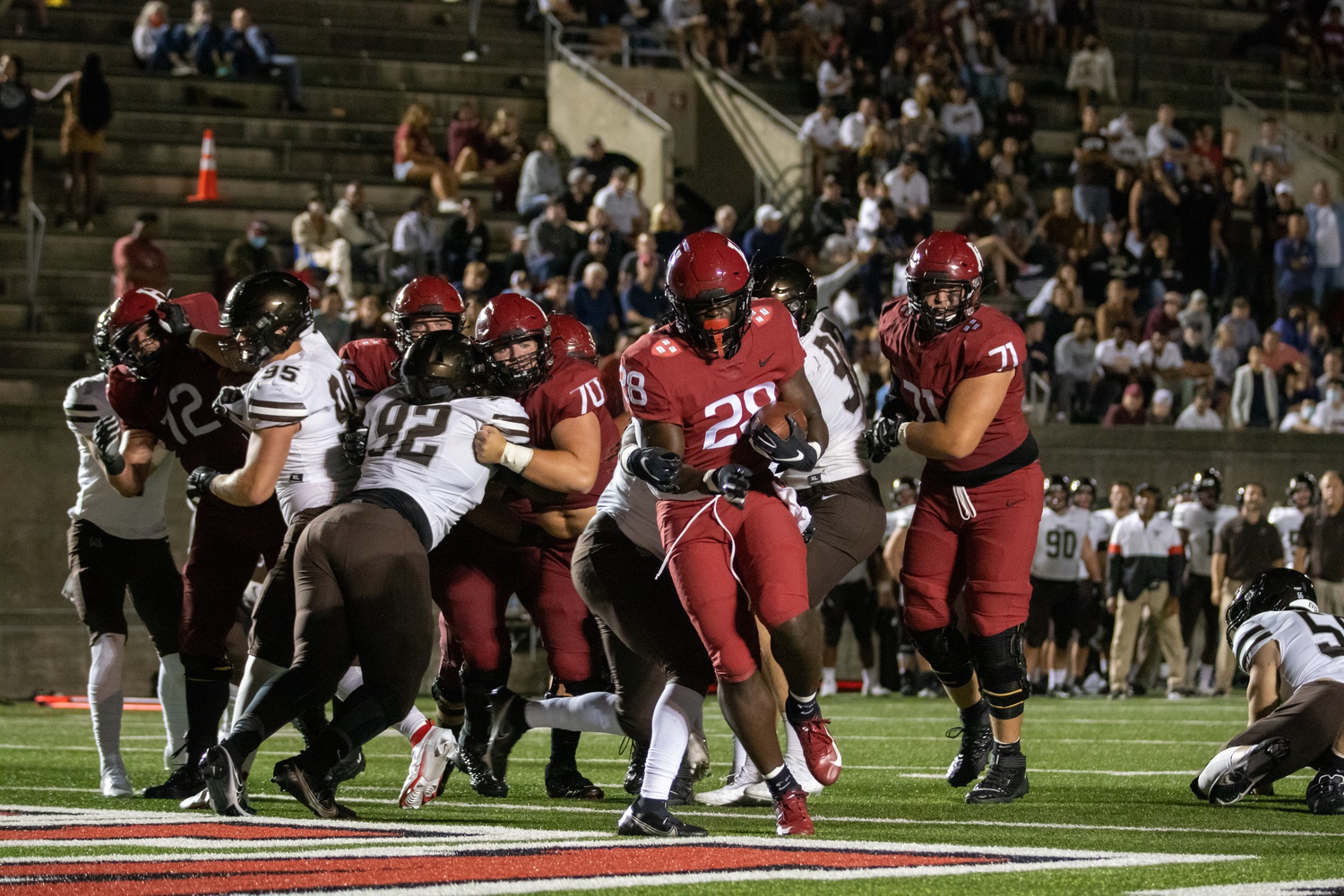 Sophomore running back Sone Ntoh punches in one of his two touchdowns on the night, which would go along with 30 yards rushing on nine carries.