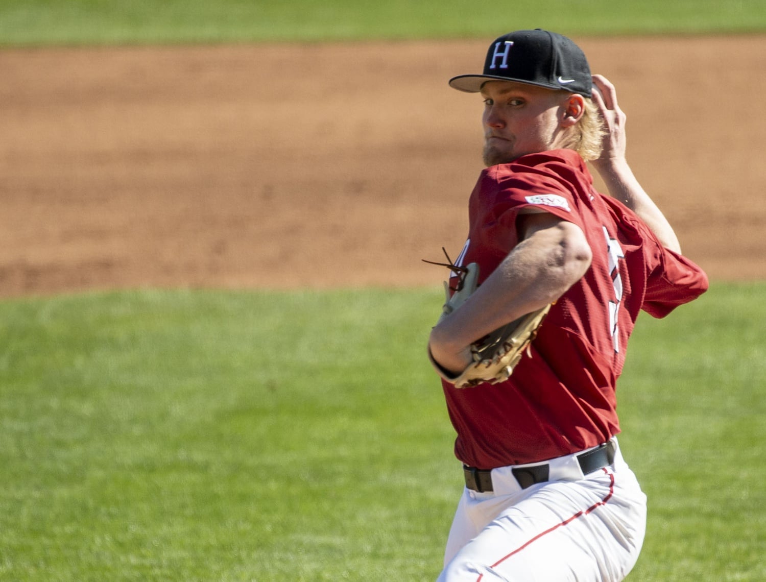 Owen Holt delivers a pitch in Harvard's 2020 loss to Alabama. He threw five scoreless innings in that start and will look to replicate that success as a member of the Reds organization.