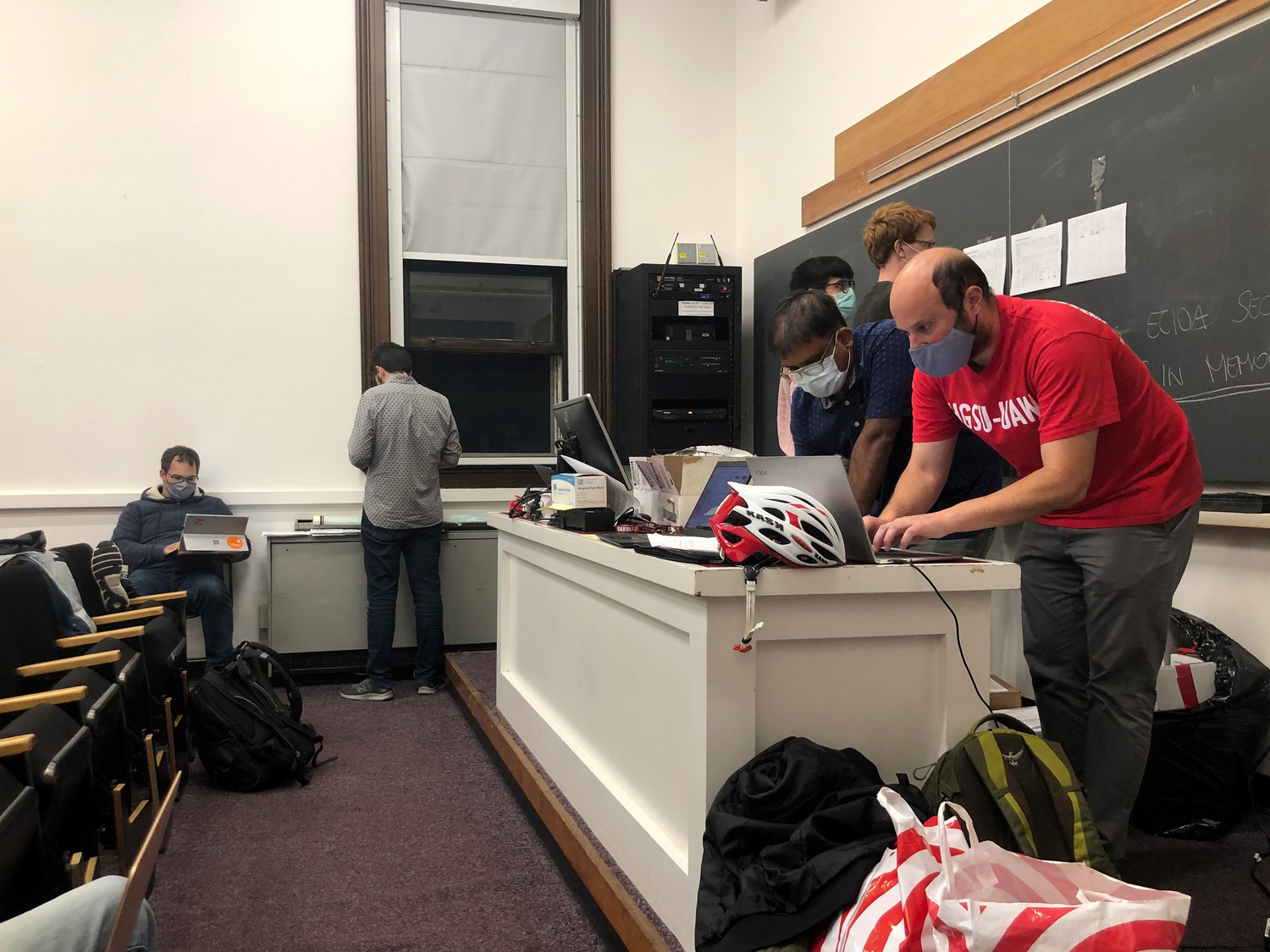 Harvard Graduate Students Union-United Automobile Workers’ Elections Committee members counted paper ballots for the union’s strike authorization vote Thursday night.