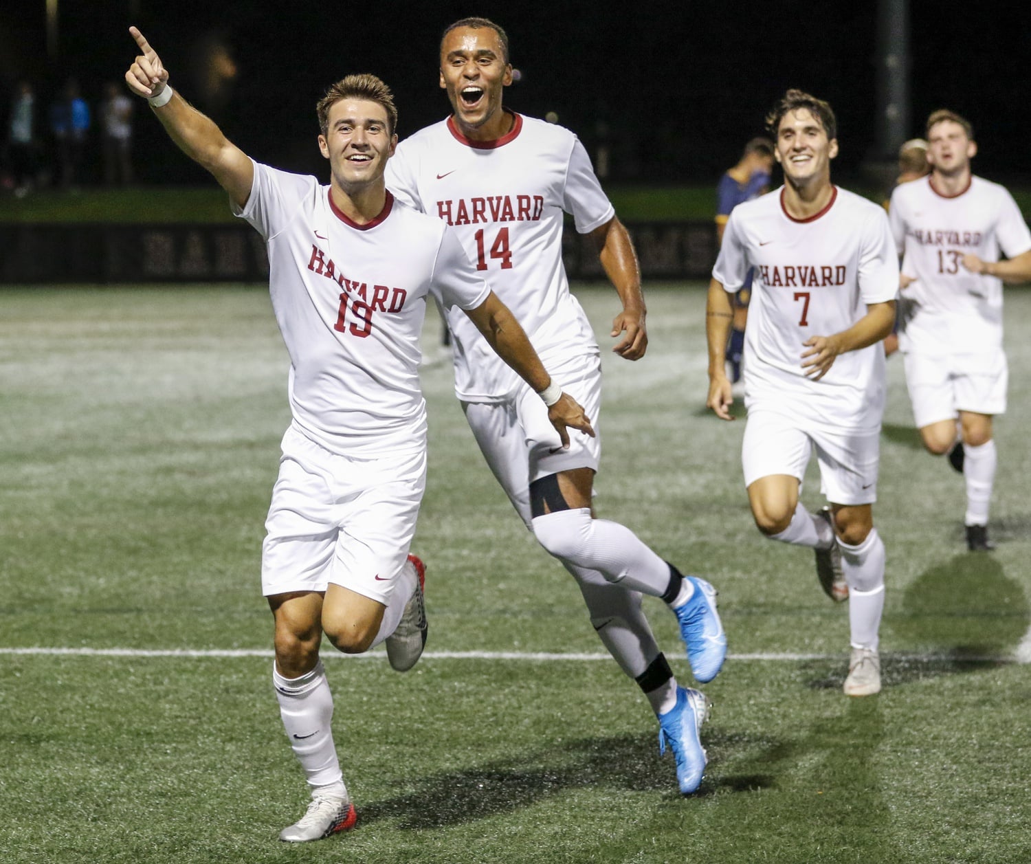 The Crimson celebrates a goal in 2019. Harvard would have reason to celebrate in the 13th minute Tuesday after knotting the game at 1-1, but New Hampshire would go on to close with two unanswered goals for a 3-1 win.