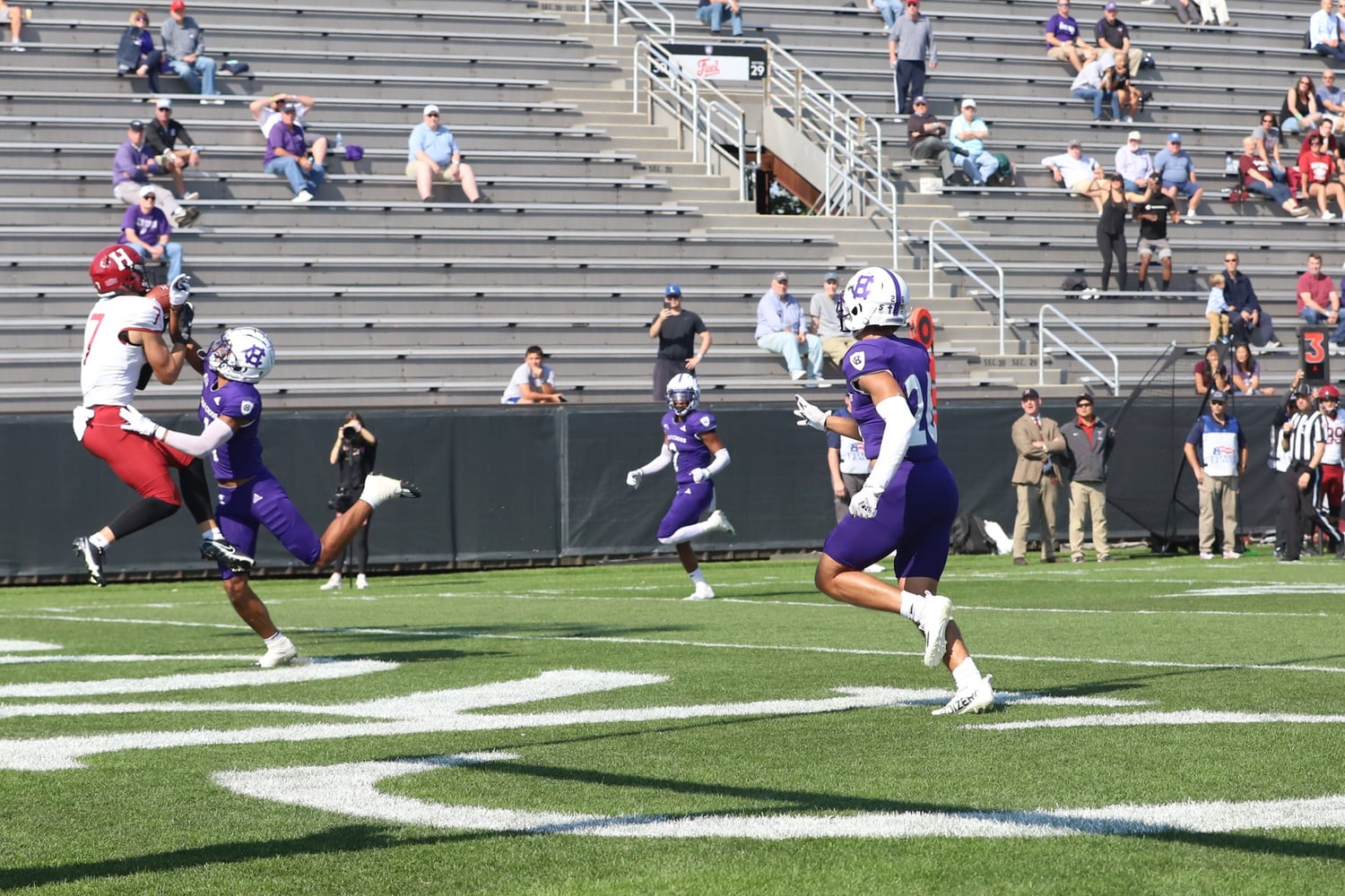 First-year wide receiver Kaedyn Odermann hauls in a touchdown grab to give Harvard a 14-0 lead.