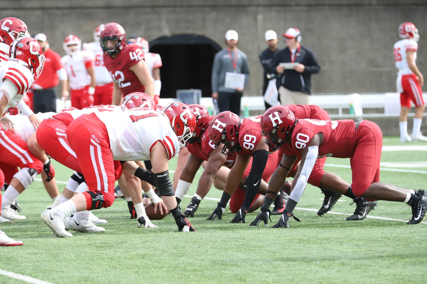 The Harvard defensive line, led by junior Truman Jones, gears up for a confrontation with Big Red offensive line in Saturday's matchup.