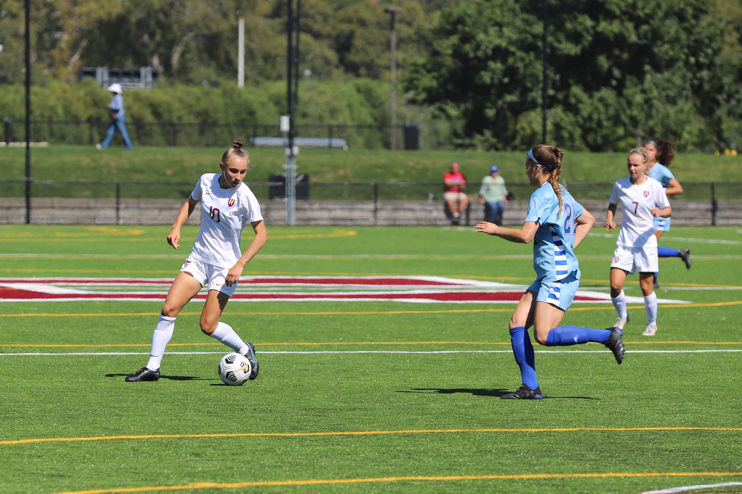 Junior center forward Angela Caloia (#10) led the scoring charge for the Crimson against Cornell, netting two of Harvard's four goals.