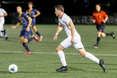 Cover image for Harvard Ties Brown in Grueling Overtime Match