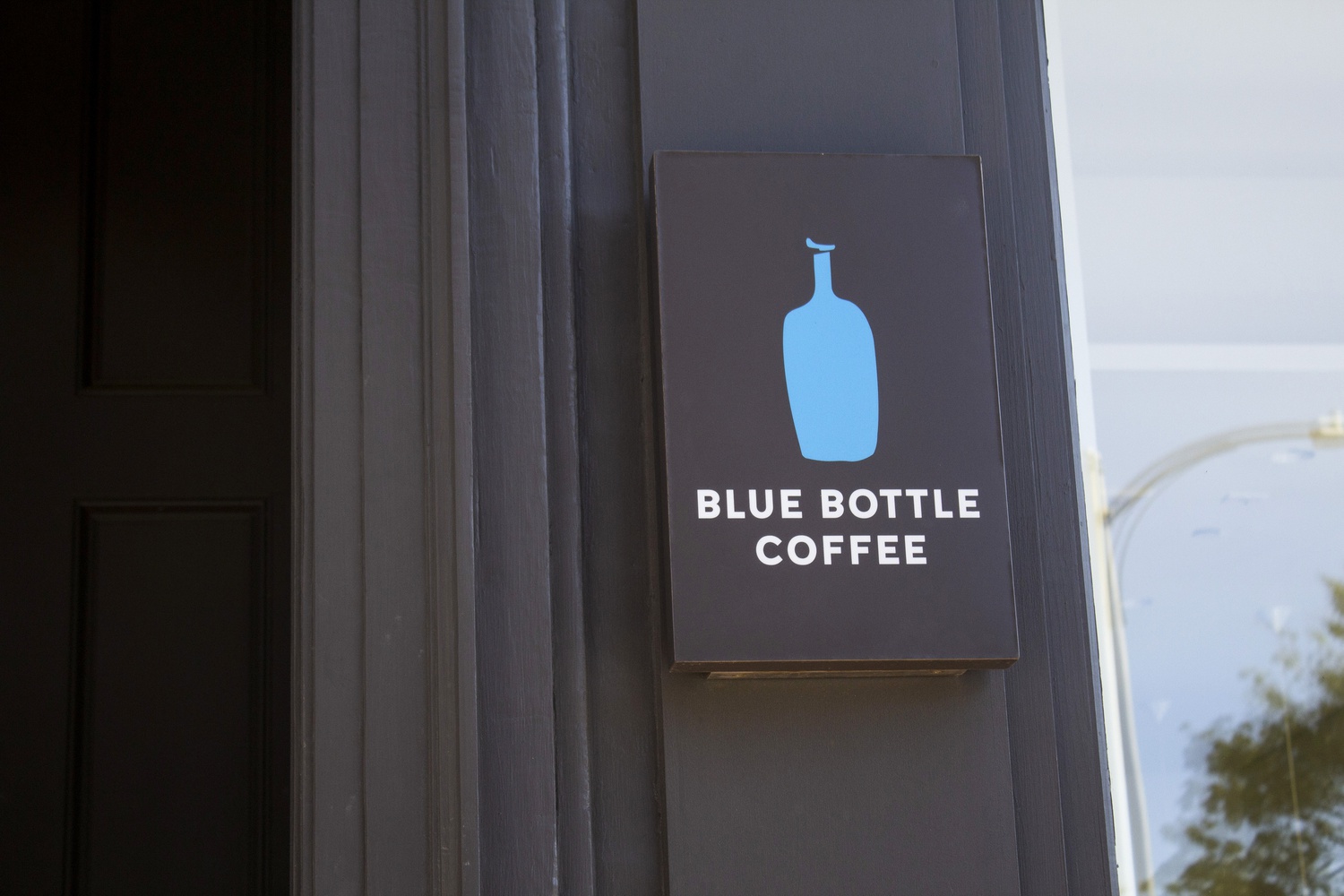 A sign outside Blue Bottle's location in Harvard Square. Workers at the chain began a strike on Wednesday that is set to last until Sunday.