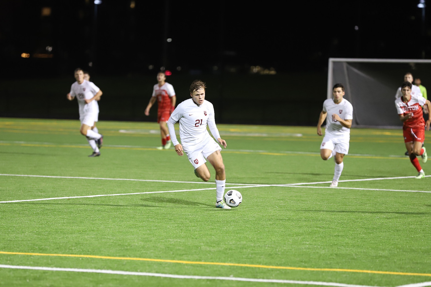 Sophomore midfielder Willem Ebbinge advances the ball up the field in a match against Boston earlier this season. Ebbinge picked up two assists in Tuesday's game against Holy Cross, bringing his team-leading assist total to eight on the season.