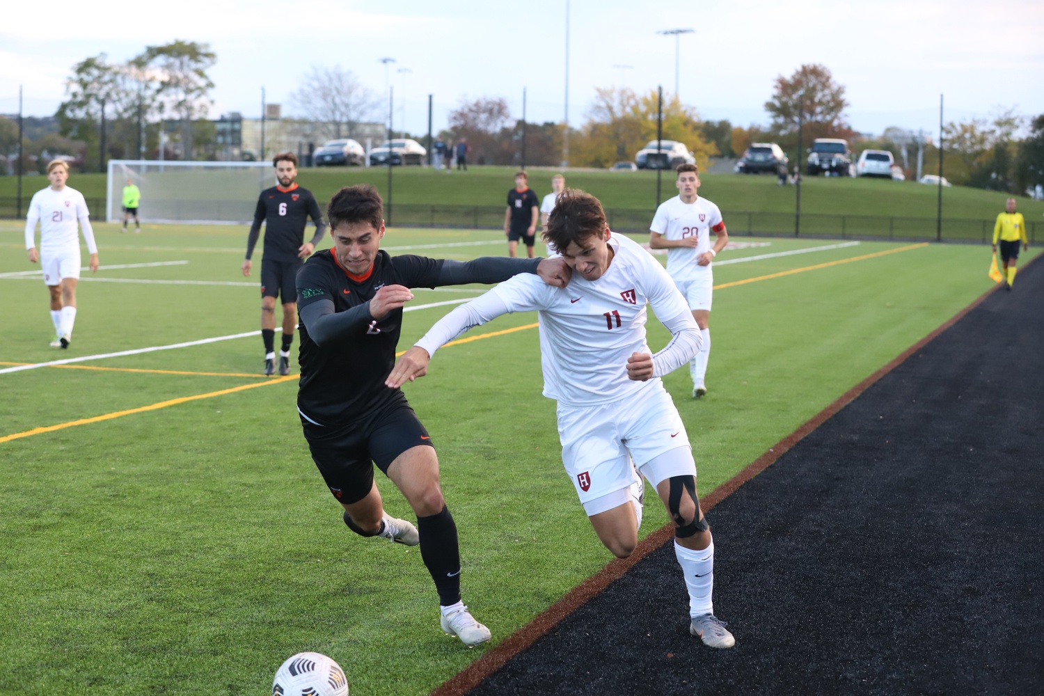 Junior forward/midfielder Martin Vician chases the ball down the sideline during Harvard's 4-1 defeat to Princeton.