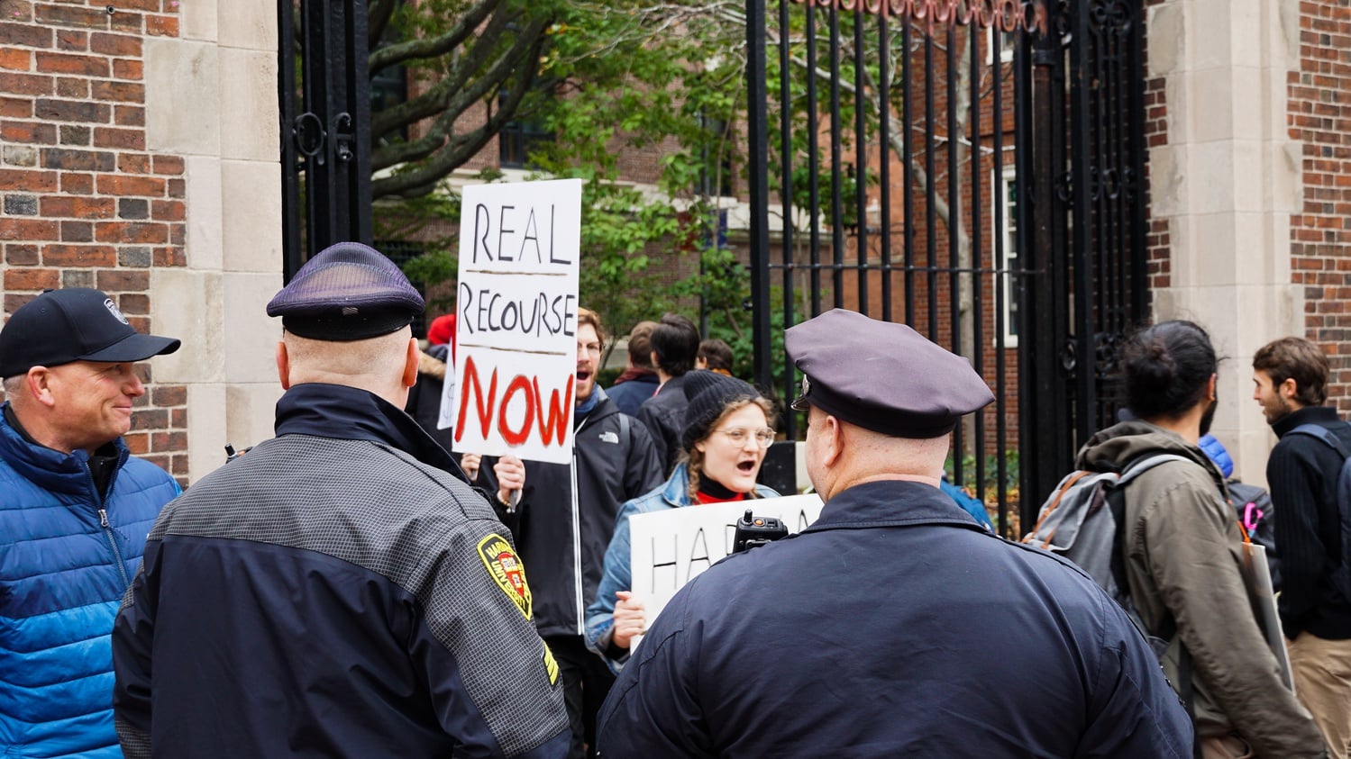 During Thursday's demonstration for the Harvard graduate student union's strike, tensions rose as a HUPD officer confronted picketers inside the Science Center.