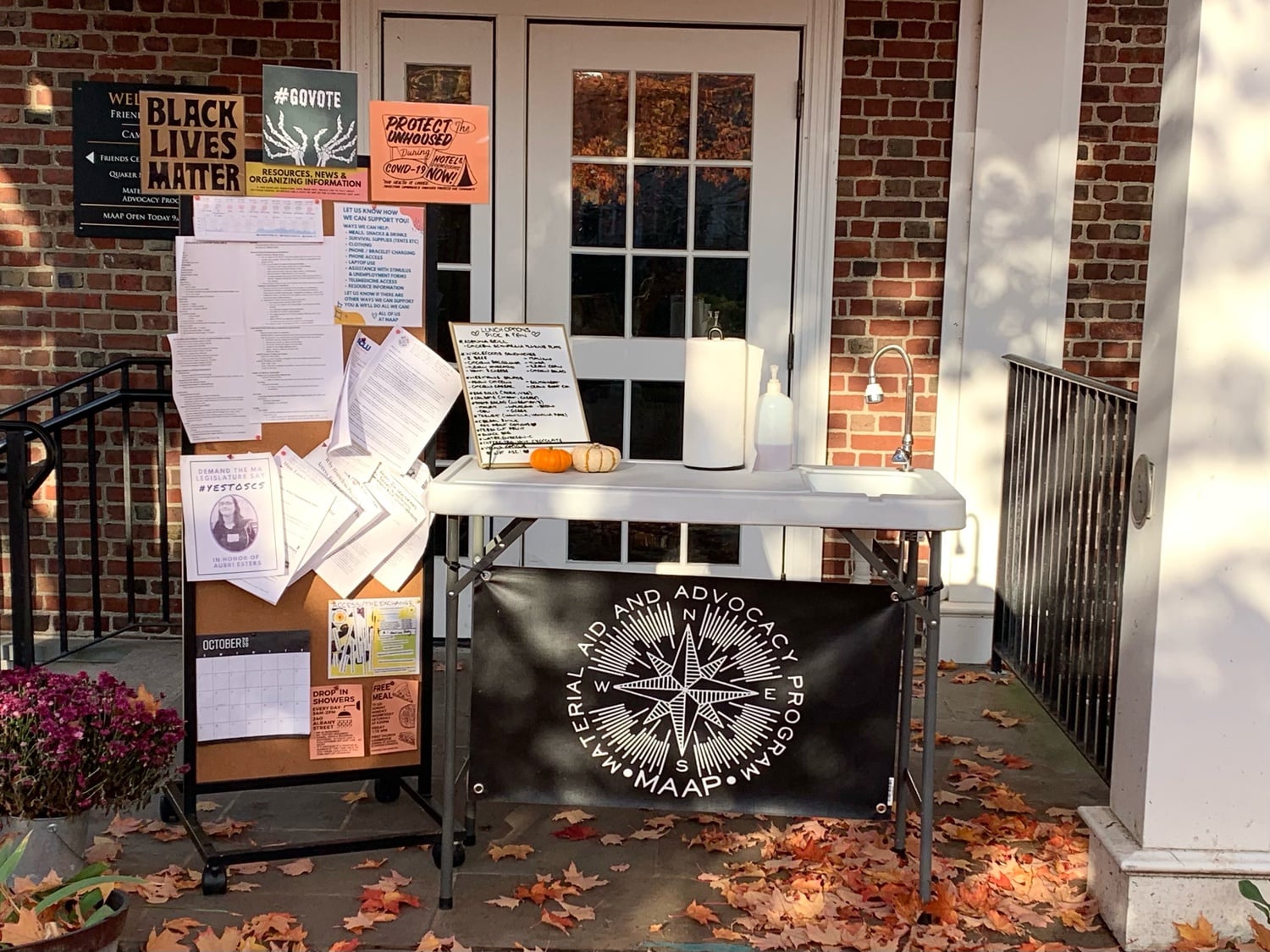 A display for the Material Aid and Advocacy Program sits ready to welcome people to the organization's drop-in space. The Material Aid and Advocacy Program, located in Cambridge, supports people living in poverty or experiencing homelessness.