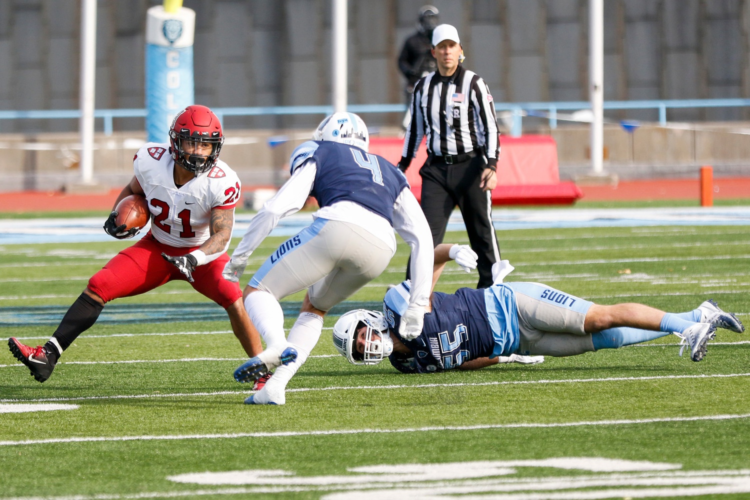 Sophomore running back Aidan Borguet evades a Columbia defender during his freshman season in 2019. The Crimson fell to the Lions in an overtime battle on the road, 17-10, two seasons ago.