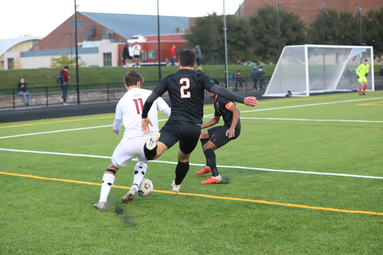 Junior forward Martin Vician navigates Princeton defenders on Oct. 23. On Saturday against Columbia, the Slovakia native opened the scoring en route to a 3-2 Crimson victory.