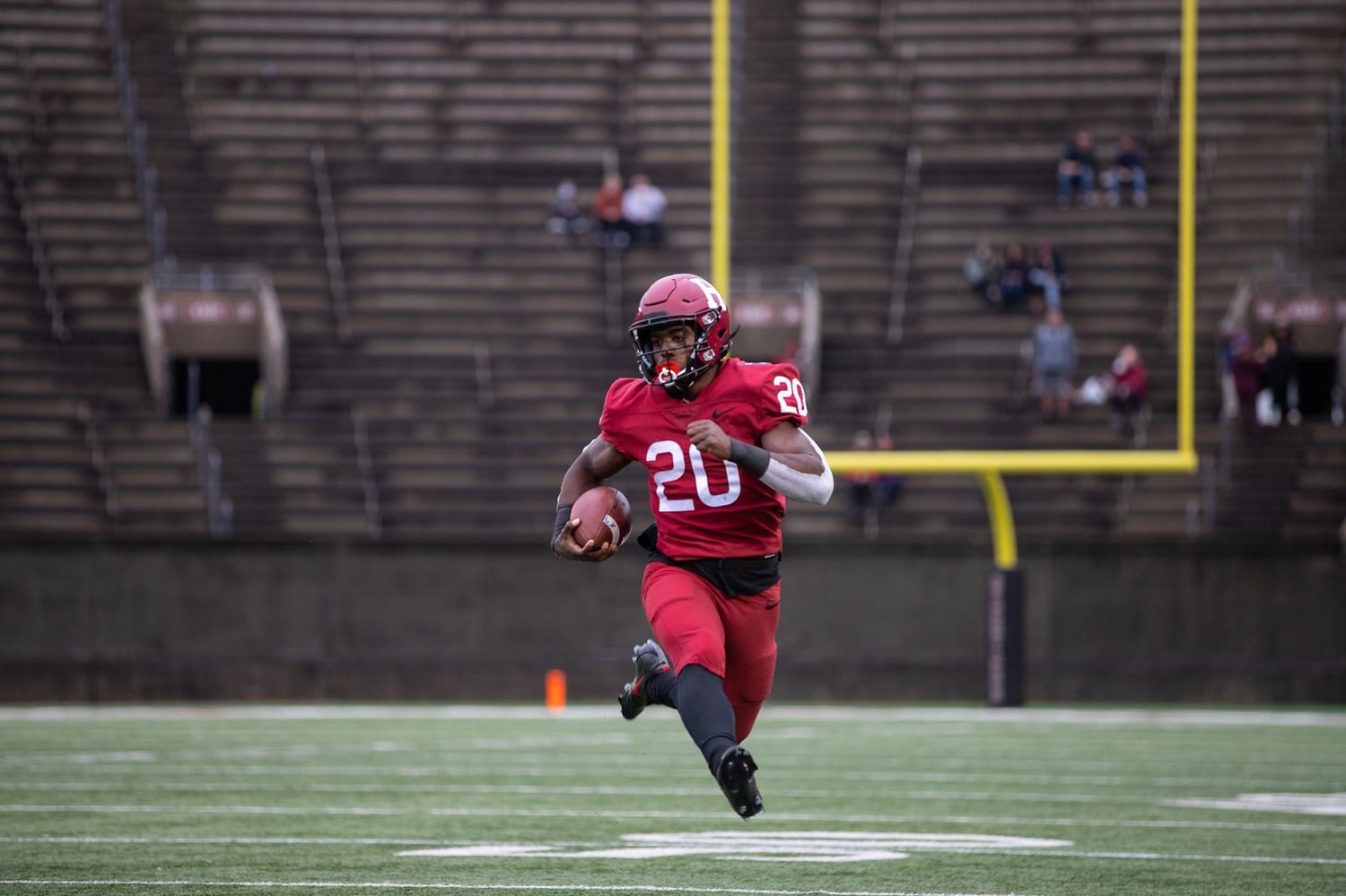 Junior running back Aaron Shampklin led the Harvard offense in Saturday's victory over Penn. He raced for 116 yards and two scores, including a 16-yard dash on the last carry at Harvard Stadium of his career.