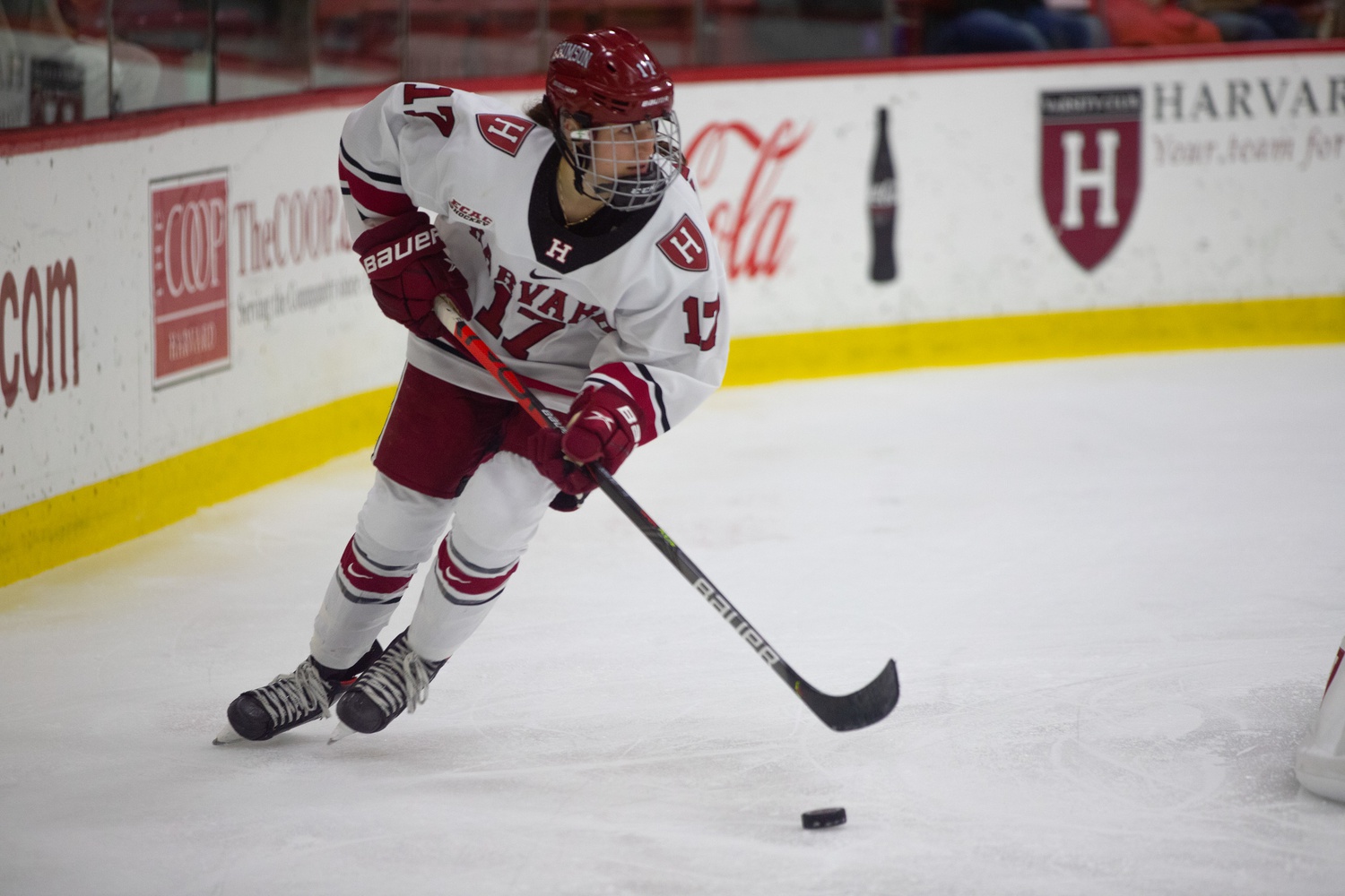 Senior Brooke Jovanovich controls the puck in a home matchup with Colgate on October 30th. The Crimson forward is a key veteran for her 7-3 squad, which is currently ranked No. 9/10 in the NCAA.