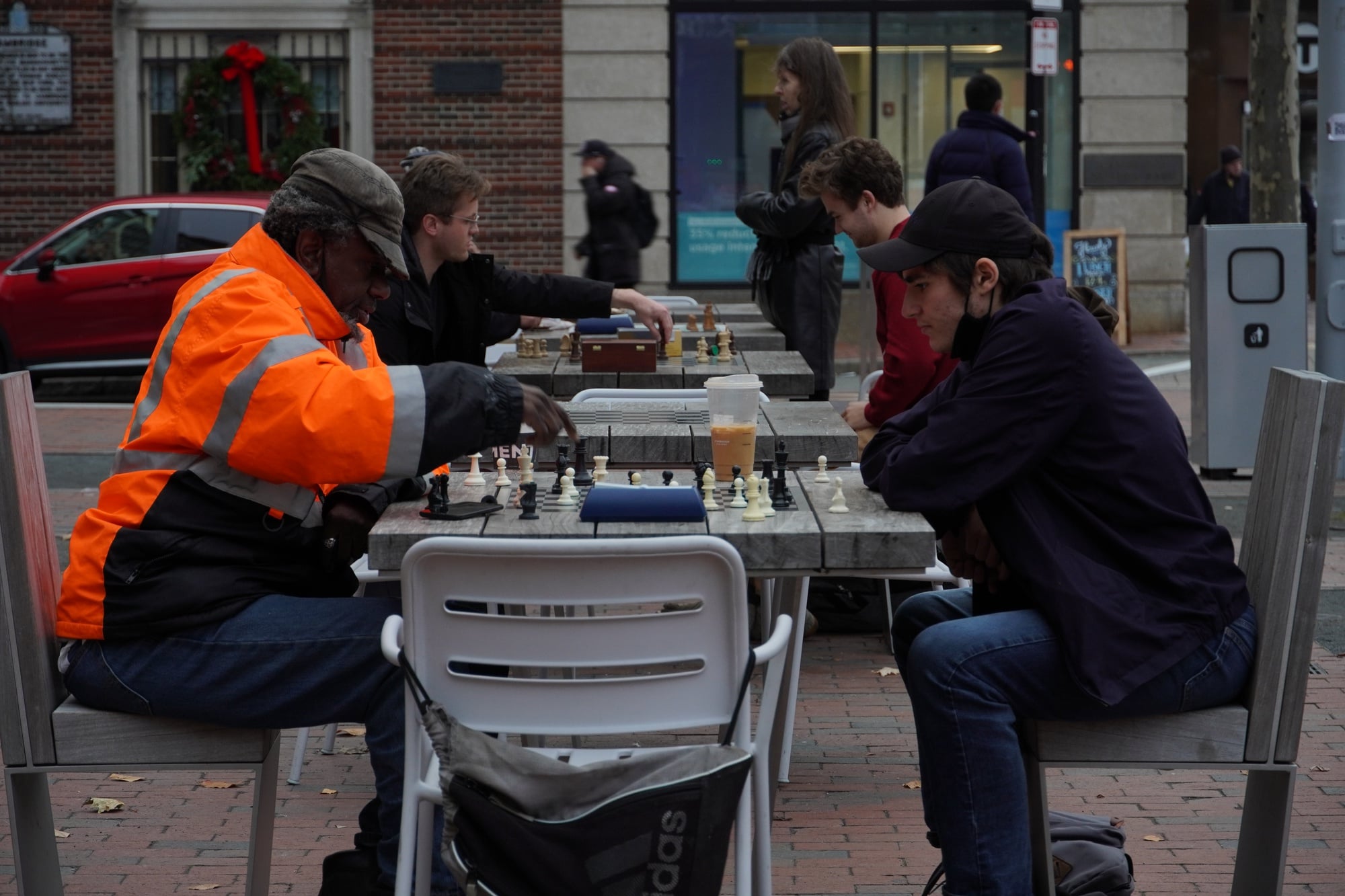 People play chess outside of the Smith Campus Center in Harvard Square.