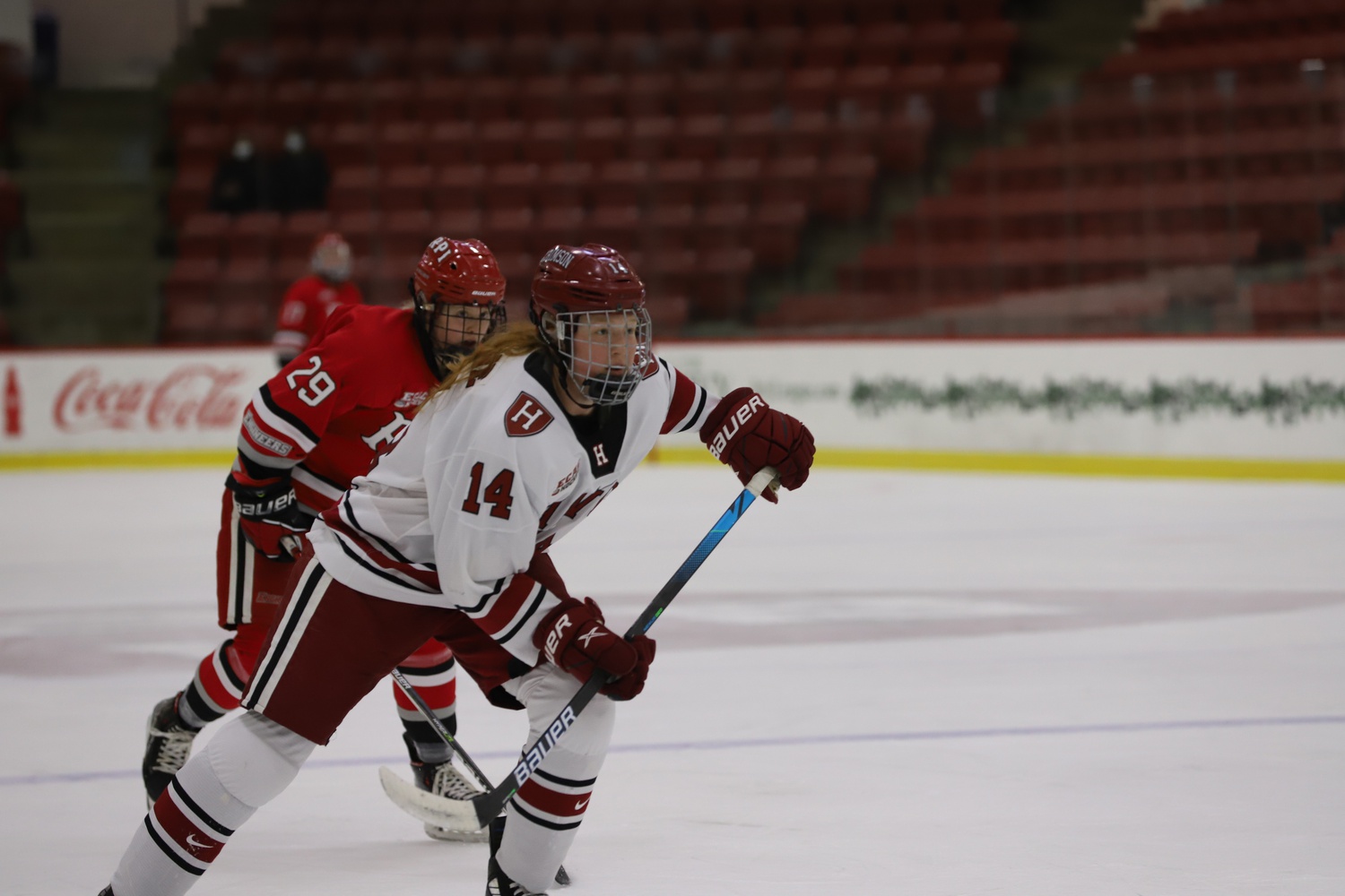 Senior forward Dominique Petrie skates up the ice during a 4-3 victory over RPI on Dec. 4, 2021. Petrie managed an assist in Harvard's 1-0 victory over Princeton on Jan. 21.