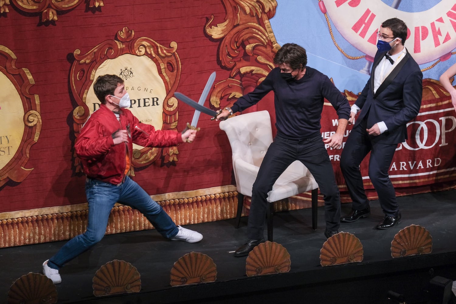 Honoree Jason Bateman duels a member of the Hasting Pudding Theatricals cast during his roast.