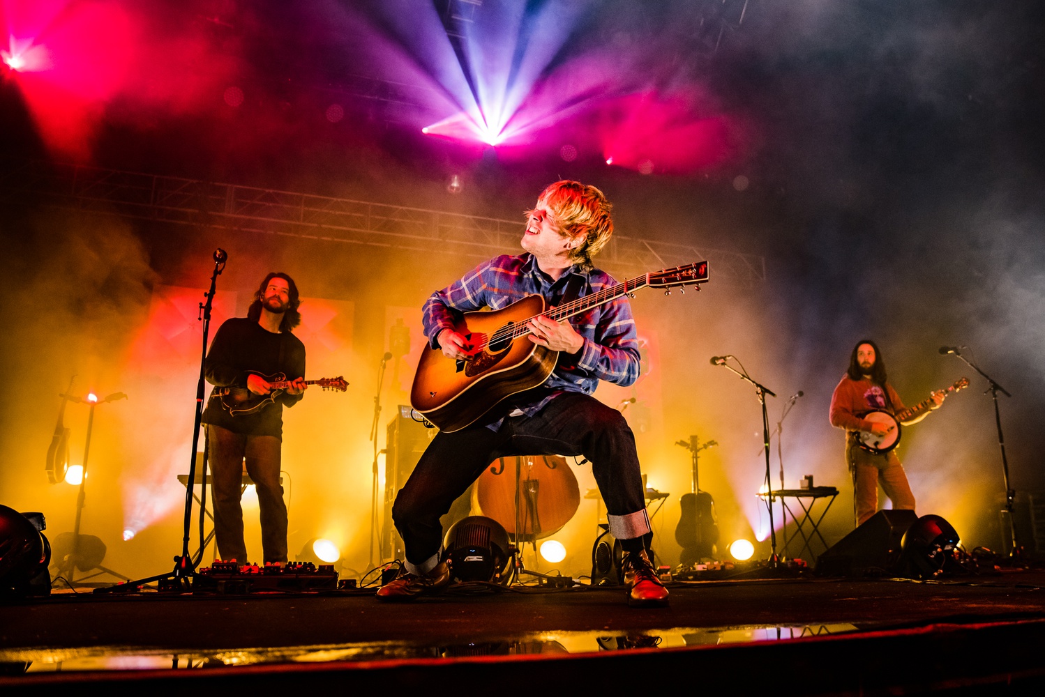 Billy Strings on stage during a tour performance.