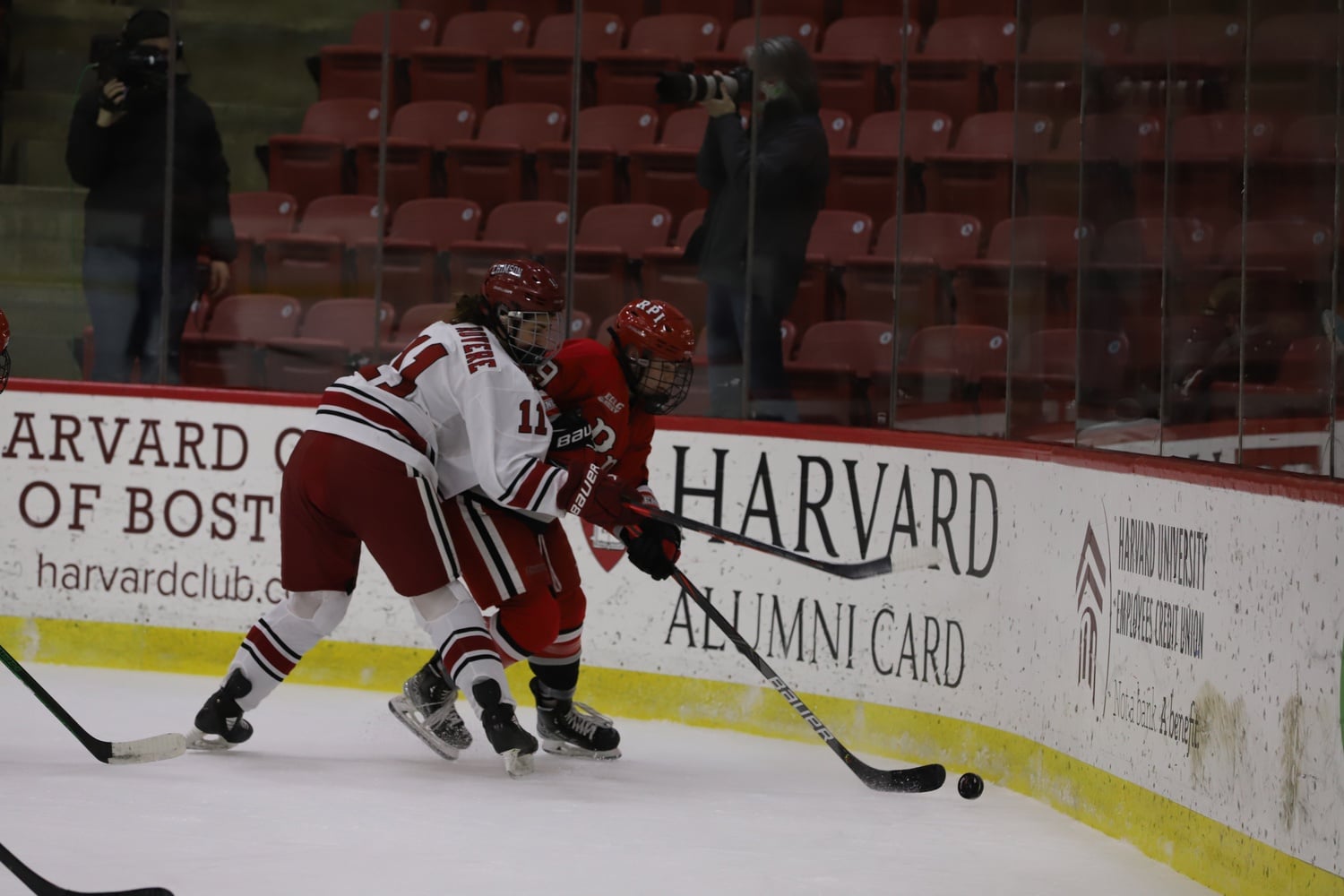 Junior forward Kristin Della Rovere battles along the boards in a 4-3 victory over RPI on Dec. 4. In the final of the Beanpot Tournament, she came away with two goals to lead the Crimson to its first title since 2015.