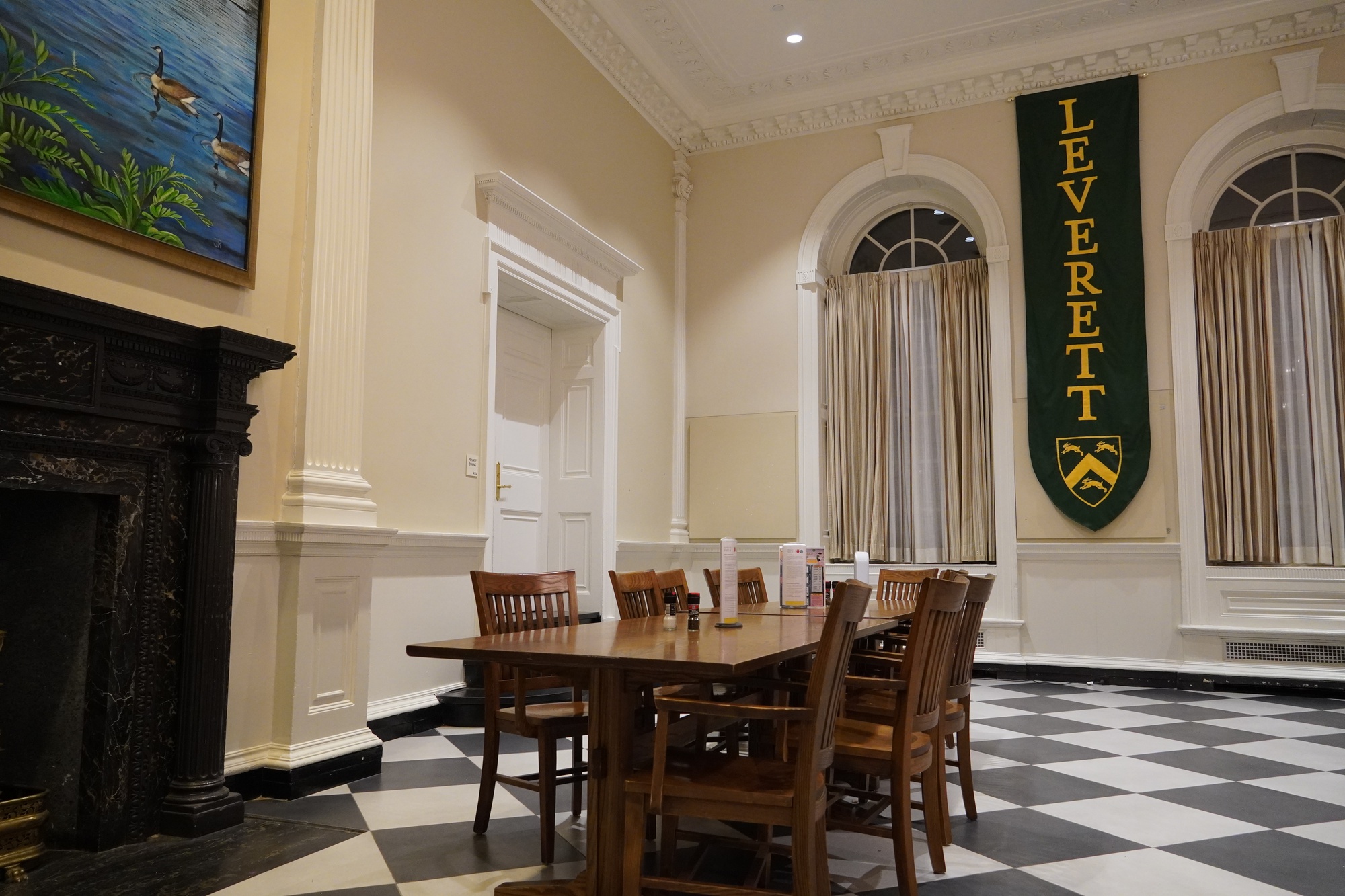 An empty table under in the Leverett dining hall.
