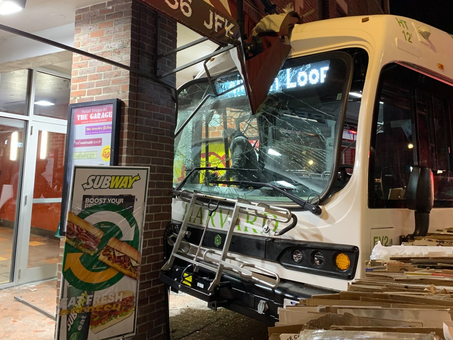 A Harvard shuttle crashed into a building on John F. Kennedy Street Wednesday evening.