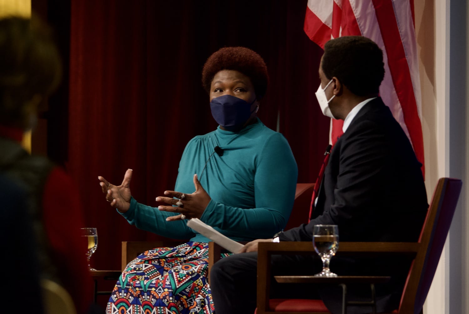Army Specialist Shoshana Johnson speaks with IOP Executive Director Setti Warren at the John F. Kennedy Jr. Forum Thursday.