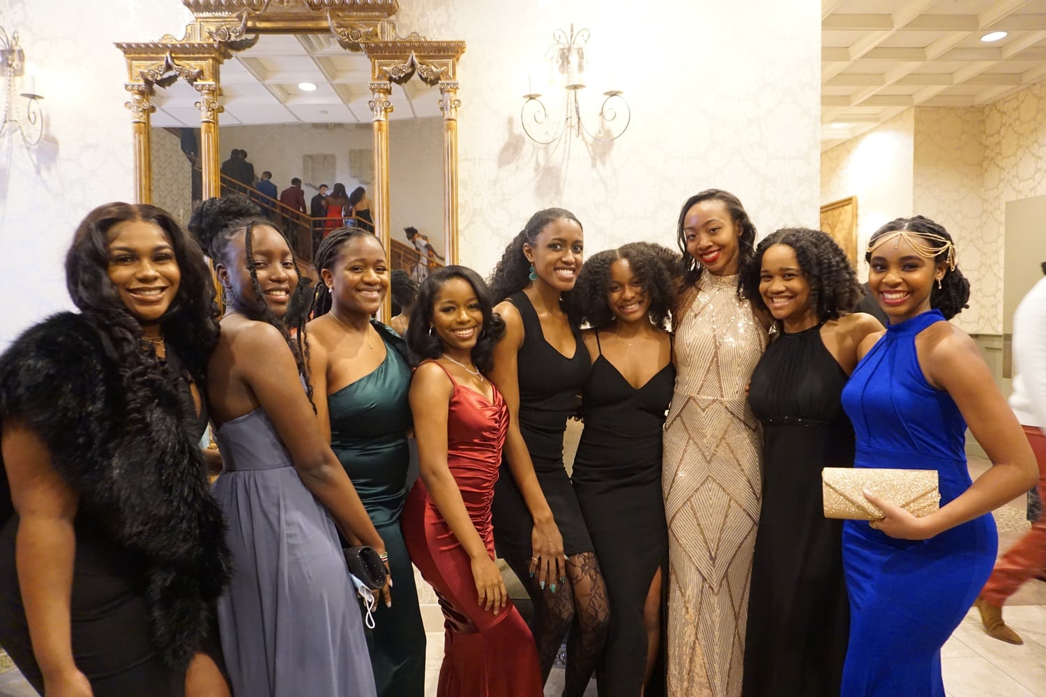 Attendees pose for a picture at the Black Legacy Ball, an event hosted by the Black Students Assocation to celebrate Black history, culture, and resilience.